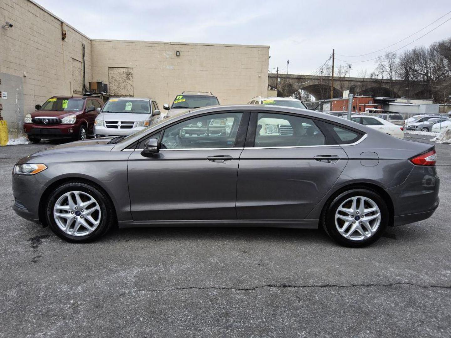 2013 GRAY FORD FUSION SE (3FA6P0H74DR) with an 2.5L engine, Automatic transmission, located at 117 North Cameron Street, Harrisburg, PA, 17101, (717) 963-8962, 40.266762, -76.875259 - WE FINANCE!!! Good Credit/ Bad Credit/ No Credit - ALL Trade-Ins Welcomed!!! ***Guaranteed Credit Approval*** APPLY ONLINE or CALL us TODAY ;) Internet Prices and Marketplace Prices are SPECIAL discounted ***CASH DEALS*** Retail Prices are higher. Please call us to discuss your cash and finan - Photo#1