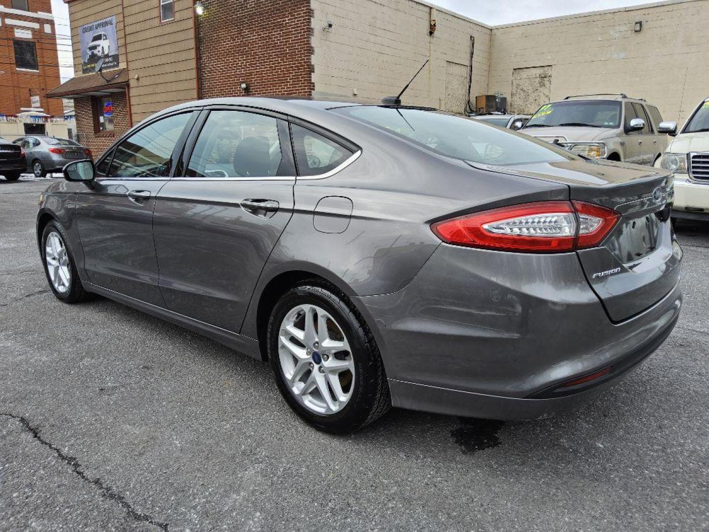 2013 GRAY FORD FUSION SE (3FA6P0H74DR) with an 2.5L engine, Automatic transmission, located at 117 North Cameron Street, Harrisburg, PA, 17101, (717) 963-8962, 40.266762, -76.875259 - WE FINANCE!!! Good Credit/ Bad Credit/ No Credit - ALL Trade-Ins Welcomed!!! ***Guaranteed Credit Approval*** APPLY ONLINE or CALL us TODAY ;) Internet Prices and Marketplace Prices are SPECIAL discounted ***CASH DEALS*** Retail Prices are higher. Please call us to discuss your cash and finan - Photo#2