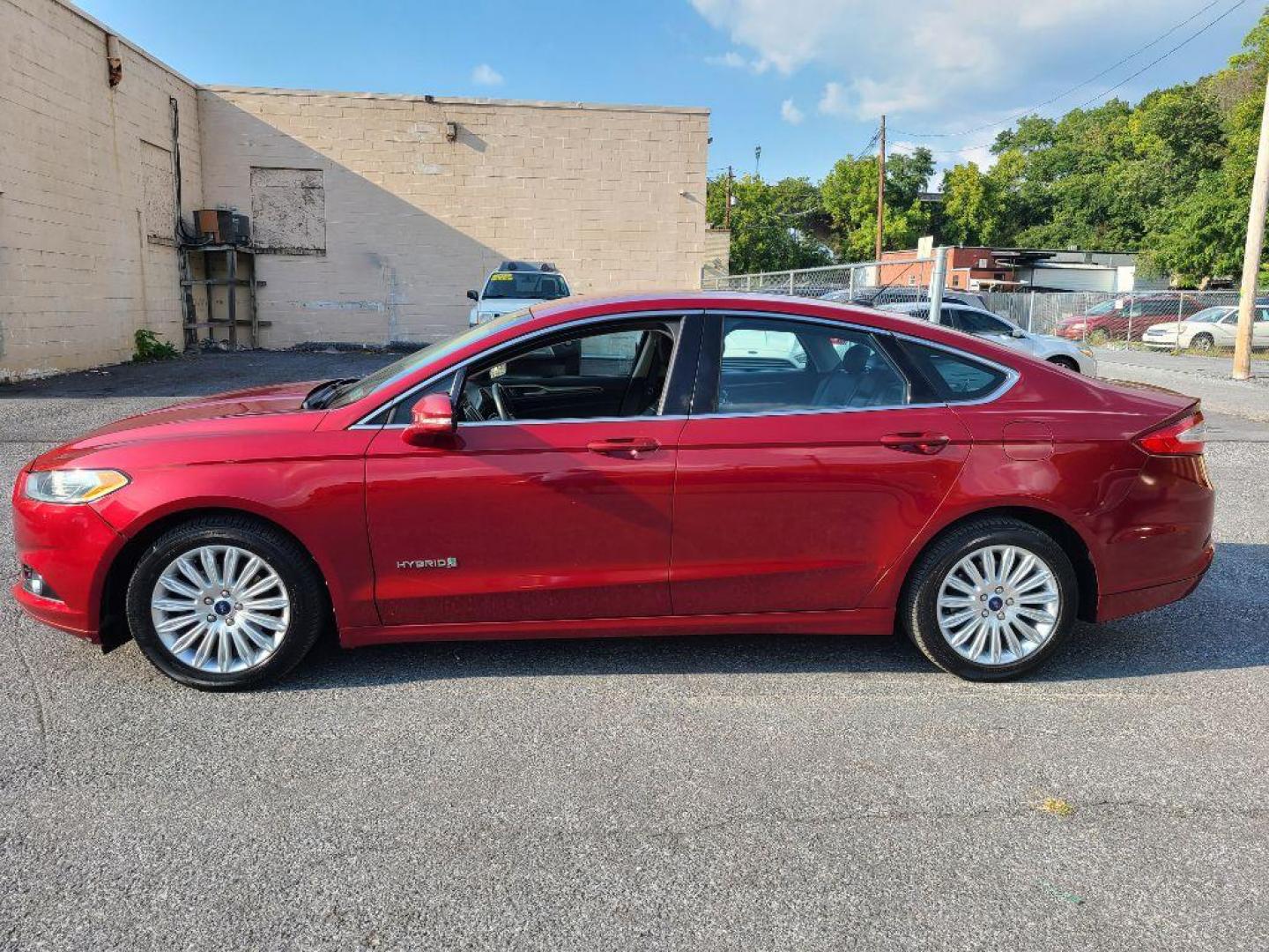 2013 RED FORD FUSION SE HYBRID (3FA6P0LU6DR) with an 2.0L engine, Continuously Variable transmission, located at 117 North Cameron Street, Harrisburg, PA, 17101, (717) 963-8962, 40.266762, -76.875259 - WE FINANCE!!! Good Credit/ Bad Credit/ No Credit - ALL Trade-Ins Welcomed!!! ***Guaranteed Credit Approval*** APPLY ONLINE or CALL us TODAY ;) Internet Prices and Marketplace Prices are SPECIAL discounted ***CASH DEALS*** Retail Prices are higher. Please call us to discuss your cash and finan - Photo#1