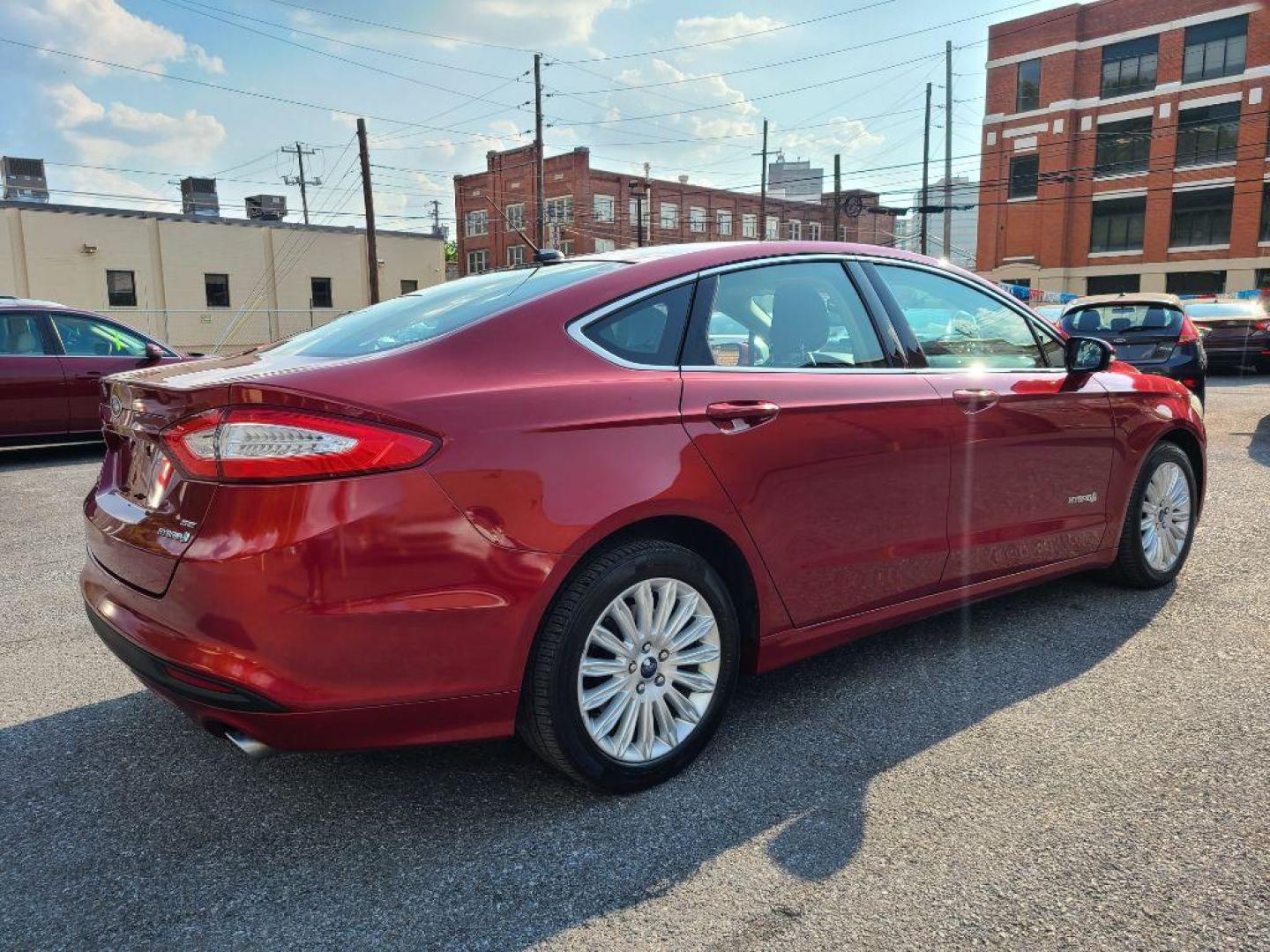 2013 RED FORD FUSION SE HYBRID (3FA6P0LU6DR) with an 2.0L engine, Continuously Variable transmission, located at 117 North Cameron Street, Harrisburg, PA, 17101, (717) 963-8962, 40.266762, -76.875259 - WE FINANCE!!! Good Credit/ Bad Credit/ No Credit - ALL Trade-Ins Welcomed!!! ***Guaranteed Credit Approval*** APPLY ONLINE or CALL us TODAY ;) Internet Prices and Marketplace Prices are SPECIAL discounted ***CASH DEALS*** Retail Prices are higher. Please call us to discuss your cash and finan - Photo#4