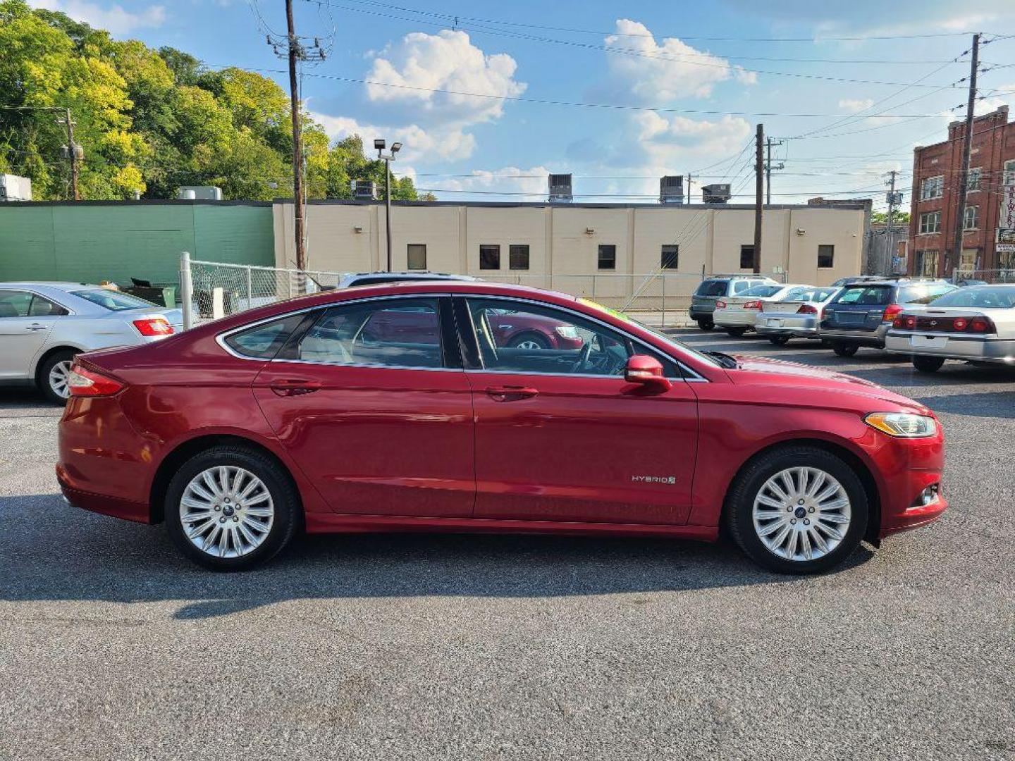 2013 RED FORD FUSION SE HYBRID (3FA6P0LU6DR) with an 2.0L engine, Continuously Variable transmission, located at 117 North Cameron Street, Harrisburg, PA, 17101, (717) 963-8962, 40.266762, -76.875259 - WE FINANCE!!! Good Credit/ Bad Credit/ No Credit - ALL Trade-Ins Welcomed!!! ***Guaranteed Credit Approval*** APPLY ONLINE or CALL us TODAY ;) Internet Prices and Marketplace Prices are SPECIAL discounted ***CASH DEALS*** Retail Prices are higher. Please call us to discuss your cash and finan - Photo#5