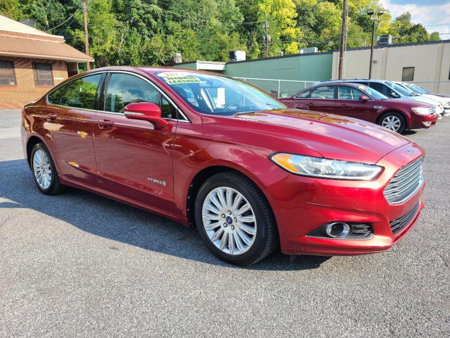 2013 RED FORD FUSION SE HYBRID (3FA6P0LU6DR) with an 2.0L engine, Continuously Variable transmission, located at 117 North Cameron Street, Harrisburg, PA, 17101, (717) 963-8962, 40.266762, -76.875259 - WE FINANCE!!! Good Credit/ Bad Credit/ No Credit - ALL Trade-Ins Welcomed!!! ***Guaranteed Credit Approval*** APPLY ONLINE or CALL us TODAY ;) Internet Prices and Marketplace Prices are SPECIAL discounted ***CASH DEALS*** Retail Prices are higher. Please call us to discuss your cash and finan - Photo#6