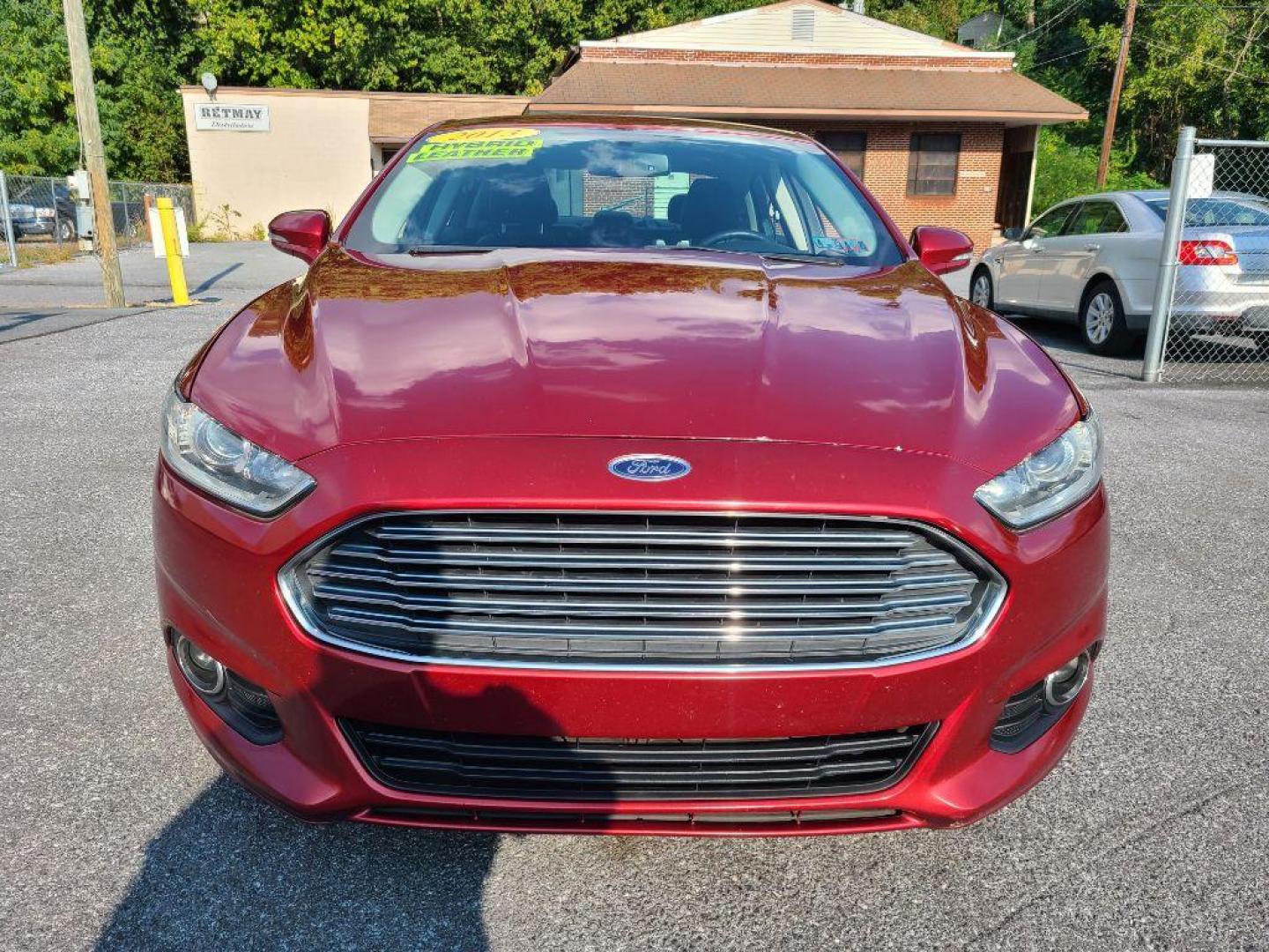 2013 RED FORD FUSION SE HYBRID (3FA6P0LU6DR) with an 2.0L engine, Continuously Variable transmission, located at 117 North Cameron Street, Harrisburg, PA, 17101, (717) 963-8962, 40.266762, -76.875259 - WE FINANCE!!! Good Credit/ Bad Credit/ No Credit - ALL Trade-Ins Welcomed!!! ***Guaranteed Credit Approval*** APPLY ONLINE or CALL us TODAY ;) Internet Prices and Marketplace Prices are SPECIAL discounted ***CASH DEALS*** Retail Prices are higher. Please call us to discuss your cash and finan - Photo#7