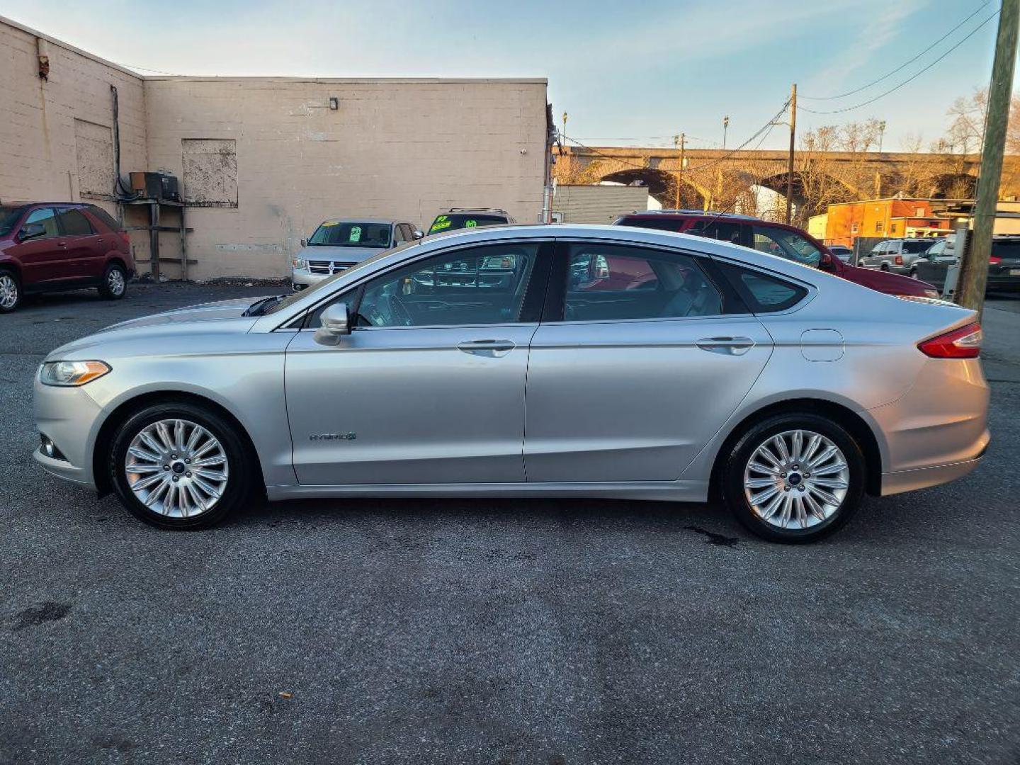 2013 SILVER FORD FUSION SE HYBRID (3FA6P0LU8DR) with an 2.0L engine, Continuously Variable transmission, located at 117 North Cameron Street, Harrisburg, PA, 17101, (717) 963-8962, 40.266762, -76.875259 - WE FINANCE!!! Good Credit/ Bad Credit/ No Credit - ALL Trade-Ins Welcomed!!! ***Guaranteed Credit Approval*** APPLY ONLINE or CALL us TODAY ;) Internet Prices and Marketplace Prices are SPECIAL discounted ***CASH DEALS*** Retail Prices are higher. Please call us to discuss your cash and finan - Photo#1