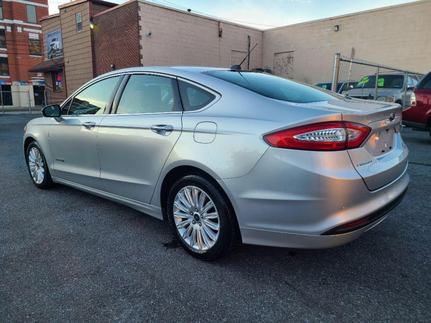 2013 SILVER FORD FUSION SE HYBRID (3FA6P0LU8DR) with an 2.0L engine, Continuously Variable transmission, located at 117 North Cameron Street, Harrisburg, PA, 17101, (717) 963-8962, 40.266762, -76.875259 - WE FINANCE!!! Good Credit/ Bad Credit/ No Credit - ALL Trade-Ins Welcomed!!! ***Guaranteed Credit Approval*** APPLY ONLINE or CALL us TODAY ;) Internet Prices and Marketplace Prices are SPECIAL discounted ***CASH DEALS*** Retail Prices are higher. Please call us to discuss your cash and finan - Photo#2