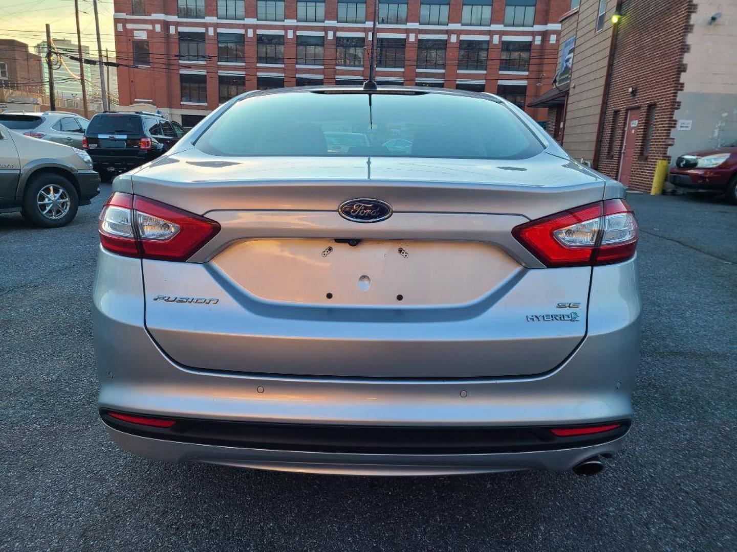 2013 SILVER FORD FUSION SE HYBRID (3FA6P0LU8DR) with an 2.0L engine, Continuously Variable transmission, located at 117 North Cameron Street, Harrisburg, PA, 17101, (717) 963-8962, 40.266762, -76.875259 - WE FINANCE!!! Good Credit/ Bad Credit/ No Credit - ALL Trade-Ins Welcomed!!! ***Guaranteed Credit Approval*** APPLY ONLINE or CALL us TODAY ;) Internet Prices and Marketplace Prices are SPECIAL discounted ***CASH DEALS*** Retail Prices are higher. Please call us to discuss your cash and finan - Photo#3