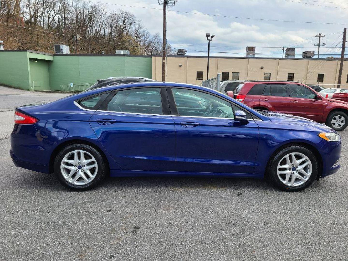 2013 BLUE FORD FUSION SE (3FA6P0H72DR) with an 2.5L engine, Automatic transmission, located at 117 North Cameron Street, Harrisburg, PA, 17101, (717) 963-8962, 40.266762, -76.875259 - WE FINANCE!!! Good Credit/ Bad Credit/ No Credit - ALL Trade-Ins Welcomed!!! ***Guaranteed Credit Approval*** APPLY ONLINE or CALL us TODAY ;) Internet Prices and Marketplace Prices are SPECIAL discounted ***CASH DEALS*** Retail Prices are higher. Please call us to discuss your cash and finan - Photo#5