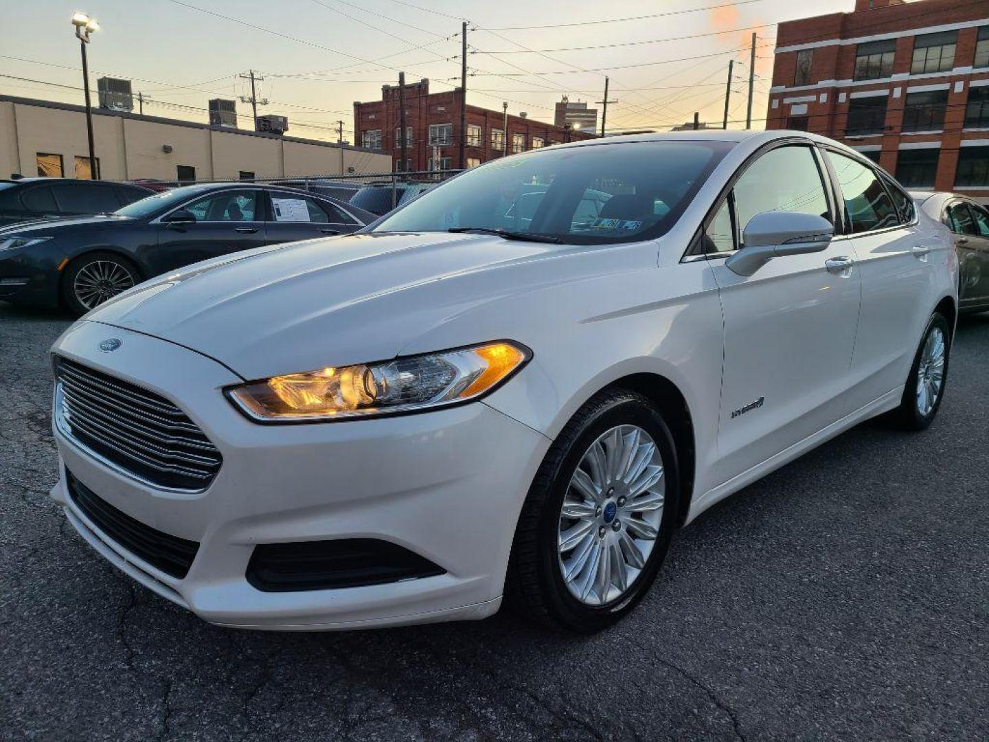 2013 WHITE FORD FUSION SE HYBRID (3FA6P0LUXDR) with an 2.0L engine, Continuously Variable transmission, located at 7981 Paxton Street, Harrisburg, PA, 17111, (717) 561-2926, 40.261490, -76.749229 - WE FINANCE!!! Good Credit/ Bad Credit/ No Credit - ALL Trade-Ins Welcomed!!! ***Guaranteed Credit Approval*** APPLY ONLINE or CALL us TODAY ;) Internet Prices and Marketplace Prices are SPECIAL discounted ***CASH DEALS*** Retail Prices are higher. Please call us to discuss your cash and finan - Photo#0