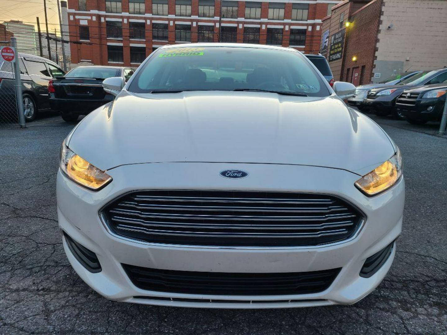 2013 WHITE FORD FUSION SE HYBRID (3FA6P0LUXDR) with an 2.0L engine, Continuously Variable transmission, located at 7981 Paxton Street, Harrisburg, PA, 17111, (717) 561-2926, 40.261490, -76.749229 - WE FINANCE!!! Good Credit/ Bad Credit/ No Credit - ALL Trade-Ins Welcomed!!! ***Guaranteed Credit Approval*** APPLY ONLINE or CALL us TODAY ;) Internet Prices and Marketplace Prices are SPECIAL discounted ***CASH DEALS*** Retail Prices are higher. Please call us to discuss your cash and finan - Photo#7