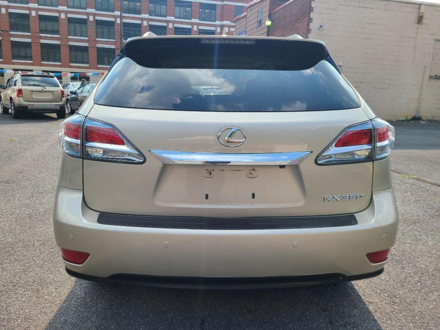 2013 GOLD LEXUS RX 350 BASE (2T2BK1BA1DC) with an 3.5L engine, Automatic transmission, located at 7981 Paxton Street, Harrisburg, PA, 17111, (717) 561-2926, 40.261490, -76.749229 - WE FINANCE!!! Good Credit/ Bad Credit/ No Credit - ALL Trade-Ins Welcomed!!! ***Guaranteed Credit Approval*** APPLY ONLINE or CALL us TODAY ;) Internet Prices and Marketplace Prices are SPECIAL discounted ***CASH DEALS*** Retail Prices are higher. Please call us to discuss your cash and finan - Photo#3