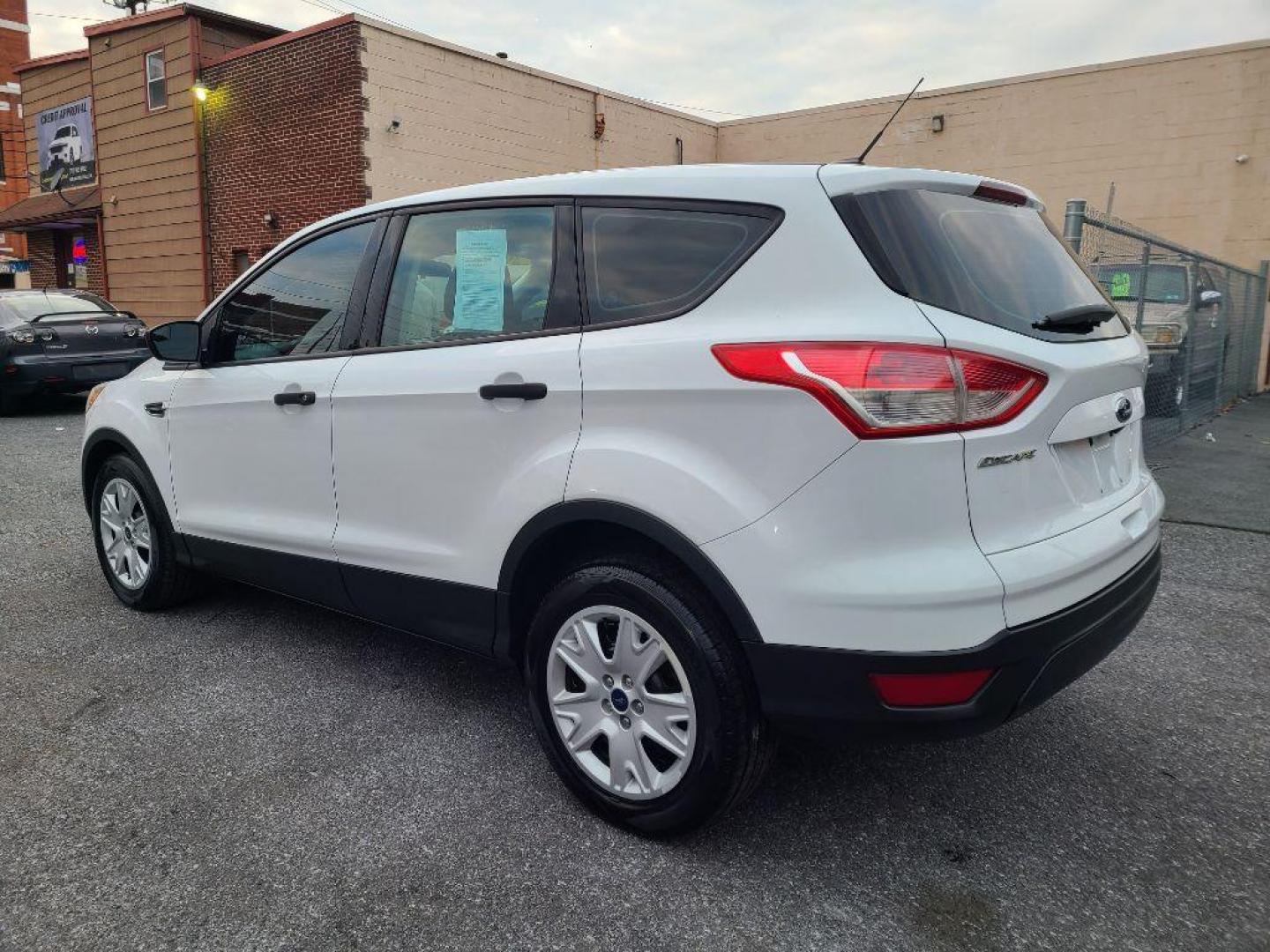 2014 WHITE FORD ESCAPE S (1FMCU0F7XEU) with an 2.5L engine, Automatic transmission, located at 7981 Paxton Street, Harrisburg, PA, 17111, (717) 561-2926, 40.261490, -76.749229 - WE FINANCE!!! Good Credit/ Bad Credit/ No Credit - ALL Trade-Ins Welcomed!!! ***Guaranteed Credit Approval*** APPLY ONLINE or CALL us TODAY ;) Internet Prices and Marketplace Prices are SPECIAL discounted ***CASH DEALS*** Retail Prices are higher. Please call us to discuss your cash and finan - Photo#2