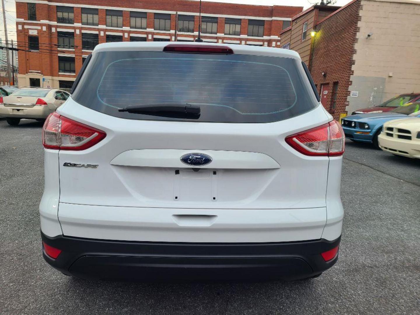 2014 WHITE FORD ESCAPE S (1FMCU0F7XEU) with an 2.5L engine, Automatic transmission, located at 7981 Paxton Street, Harrisburg, PA, 17111, (717) 561-2926, 40.261490, -76.749229 - WE FINANCE!!! Good Credit/ Bad Credit/ No Credit - ALL Trade-Ins Welcomed!!! ***Guaranteed Credit Approval*** APPLY ONLINE or CALL us TODAY ;) Internet Prices and Marketplace Prices are SPECIAL discounted ***CASH DEALS*** Retail Prices are higher. Please call us to discuss your cash and finan - Photo#3