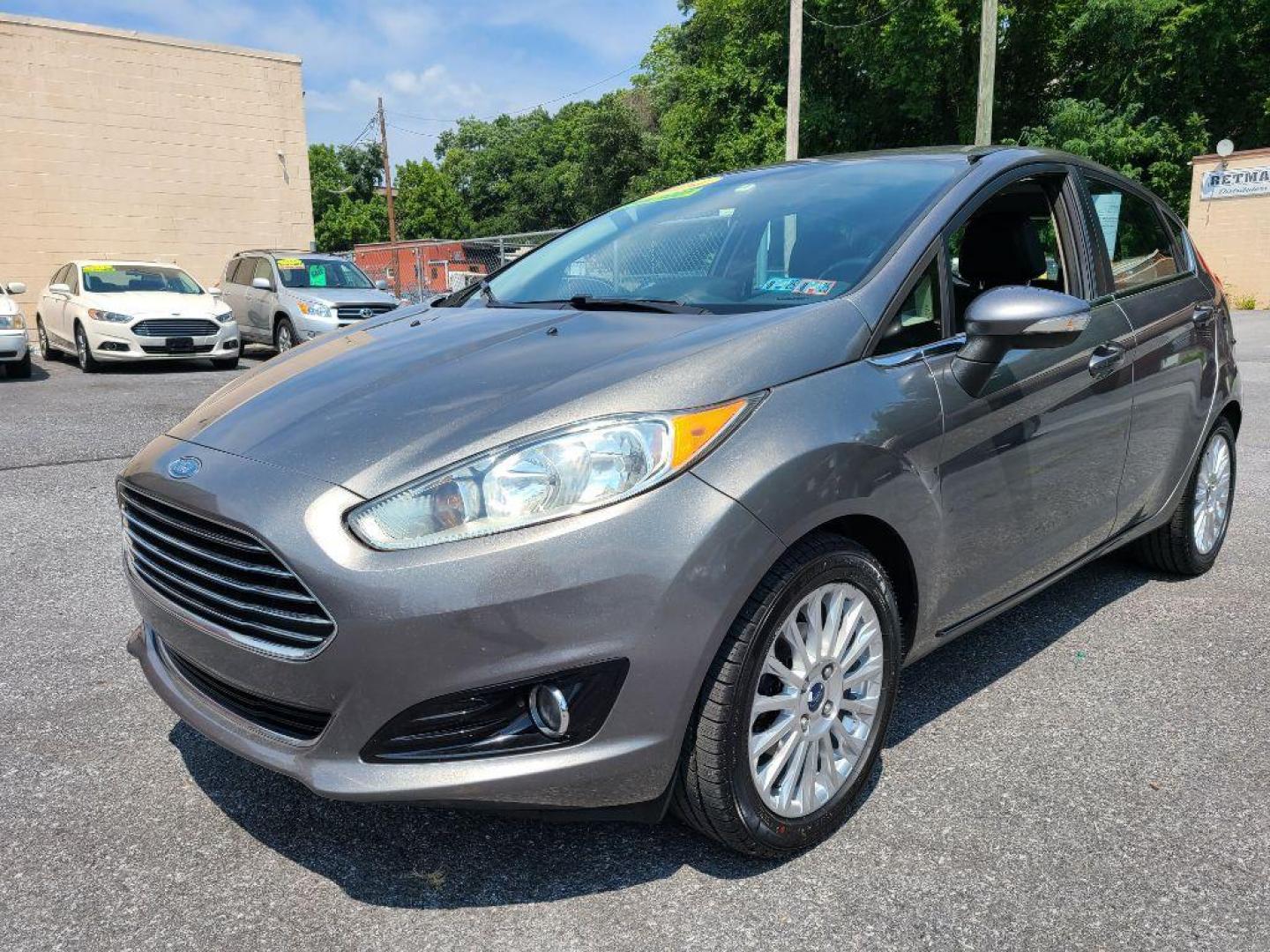 2014 GREY FORD FIESTA TITANIUM (3FADP4FJ9EM) with an 1.6L engine, Automatic transmission, located at 117 North Cameron Street, Harrisburg, PA, 17101, (717) 963-8962, 40.266762, -76.875259 - WE FINANCE!!! Good Credit/ Bad Credit/ No Credit - ALL Trade-Ins Welcomed!!! ***Guaranteed Credit Approval*** APPLY ONLINE or CALL us TODAY ;) Internet Prices and Marketplace Prices are SPECIAL discounted ***CASH DEALS*** Retail Prices are higher. Please call us to discuss your cash and finan - Photo#0