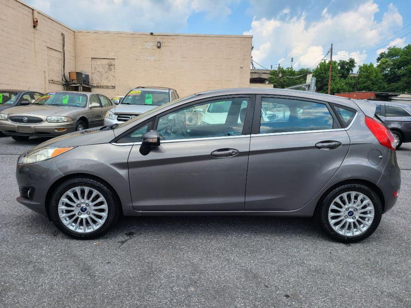 2014 GREY FORD FIESTA TITANIUM (3FADP4FJ9EM) with an 1.6L engine, Automatic transmission, located at 117 North Cameron Street, Harrisburg, PA, 17101, (717) 963-8962, 40.266762, -76.875259 - WE FINANCE!!! Good Credit/ Bad Credit/ No Credit - ALL Trade-Ins Welcomed!!! ***Guaranteed Credit Approval*** APPLY ONLINE or CALL us TODAY ;) Internet Prices and Marketplace Prices are SPECIAL discounted ***CASH DEALS*** Retail Prices are higher. Please call us to discuss your cash and finan - Photo#1