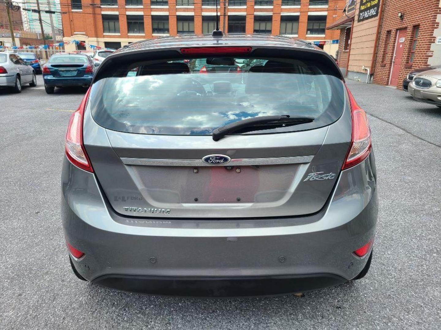 2014 GREY FORD FIESTA TITANIUM (3FADP4FJ9EM) with an 1.6L engine, Automatic transmission, located at 117 North Cameron Street, Harrisburg, PA, 17101, (717) 963-8962, 40.266762, -76.875259 - WE FINANCE!!! Good Credit/ Bad Credit/ No Credit - ALL Trade-Ins Welcomed!!! ***Guaranteed Credit Approval*** APPLY ONLINE or CALL us TODAY ;) Internet Prices and Marketplace Prices are SPECIAL discounted ***CASH DEALS*** Retail Prices are higher. Please call us to discuss your cash and finan - Photo#3