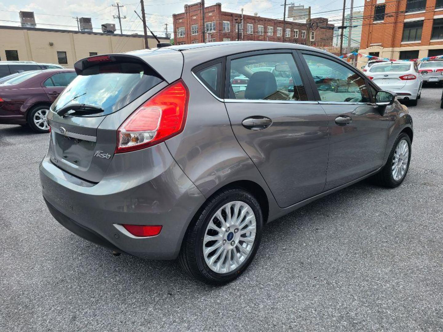 2014 GREY FORD FIESTA TITANIUM (3FADP4FJ9EM) with an 1.6L engine, Automatic transmission, located at 117 North Cameron Street, Harrisburg, PA, 17101, (717) 963-8962, 40.266762, -76.875259 - WE FINANCE!!! Good Credit/ Bad Credit/ No Credit - ALL Trade-Ins Welcomed!!! ***Guaranteed Credit Approval*** APPLY ONLINE or CALL us TODAY ;) Internet Prices and Marketplace Prices are SPECIAL discounted ***CASH DEALS*** Retail Prices are higher. Please call us to discuss your cash and finan - Photo#4