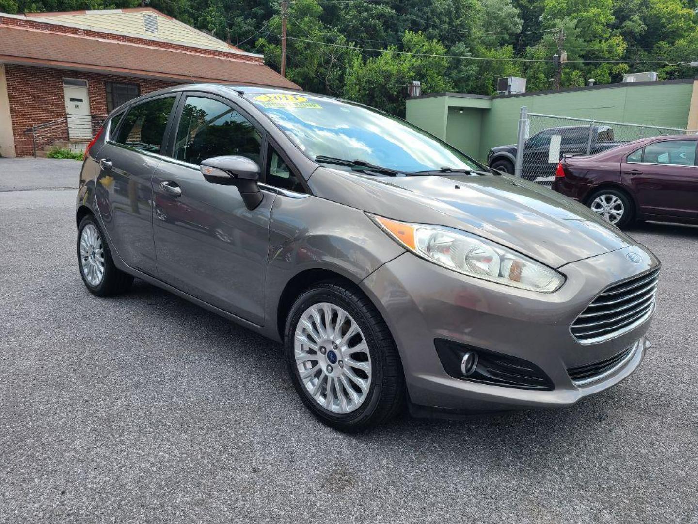 2014 GREY FORD FIESTA TITANIUM (3FADP4FJ9EM) with an 1.6L engine, Automatic transmission, located at 117 North Cameron Street, Harrisburg, PA, 17101, (717) 963-8962, 40.266762, -76.875259 - WE FINANCE!!! Good Credit/ Bad Credit/ No Credit - ALL Trade-Ins Welcomed!!! ***Guaranteed Credit Approval*** APPLY ONLINE or CALL us TODAY ;) Internet Prices and Marketplace Prices are SPECIAL discounted ***CASH DEALS*** Retail Prices are higher. Please call us to discuss your cash and finan - Photo#6