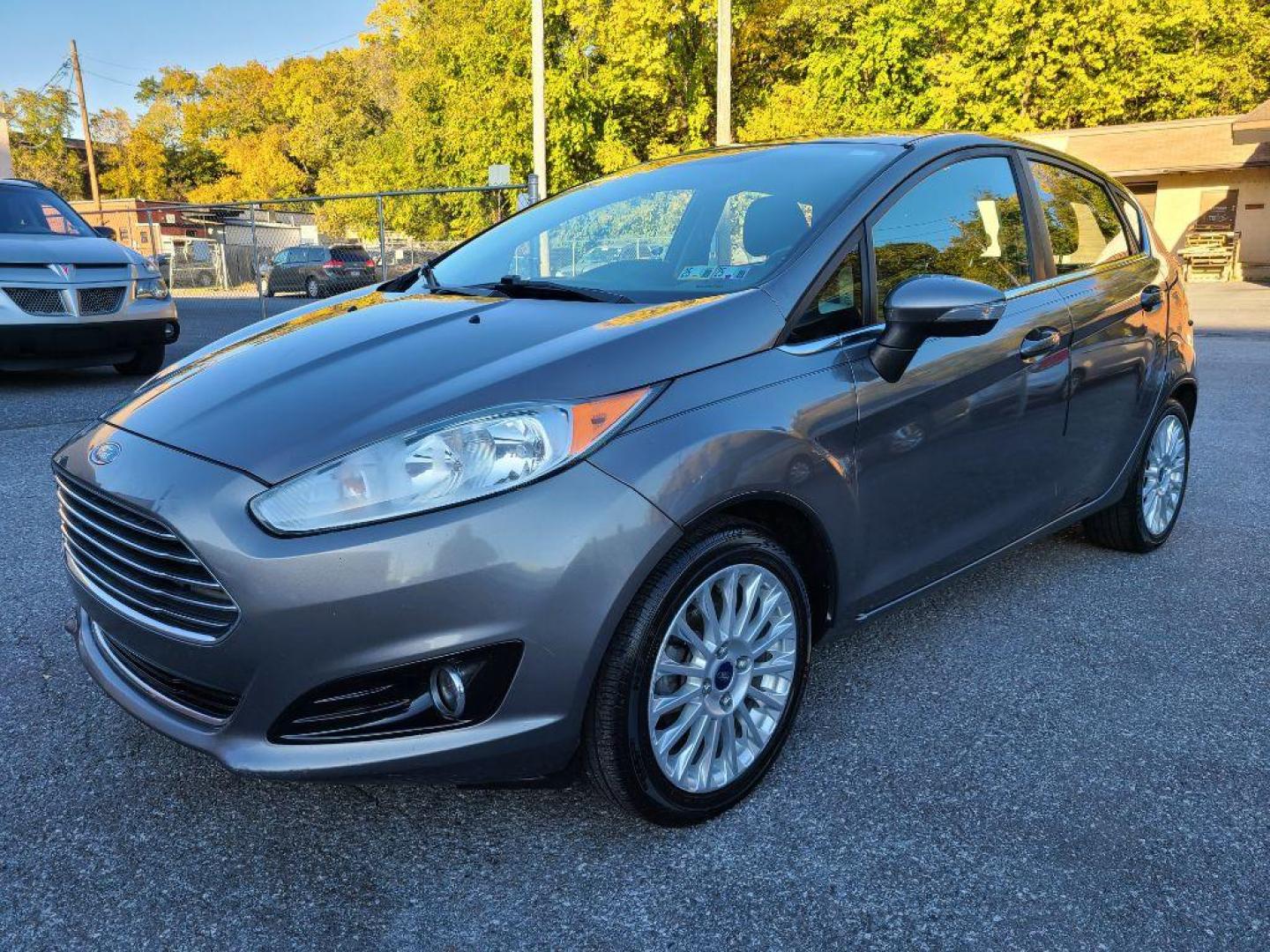 2014 GRAY FORD FIESTA TITANIUM (3FADP4FJ1EM) with an 1.6L engine, Automatic transmission, located at 117 North Cameron Street, Harrisburg, PA, 17101, (717) 963-8962, 40.266762, -76.875259 - WE FINANCE!!! Good Credit/ Bad Credit/ No Credit - ALL Trade-Ins Welcomed!!! ***Guaranteed Credit Approval*** APPLY ONLINE or CALL us TODAY ;) Internet Prices and Marketplace Prices are SPECIAL discounted ***CASH DEALS*** Retail Prices are higher. Please call us to discuss your cash and finan - Photo#0