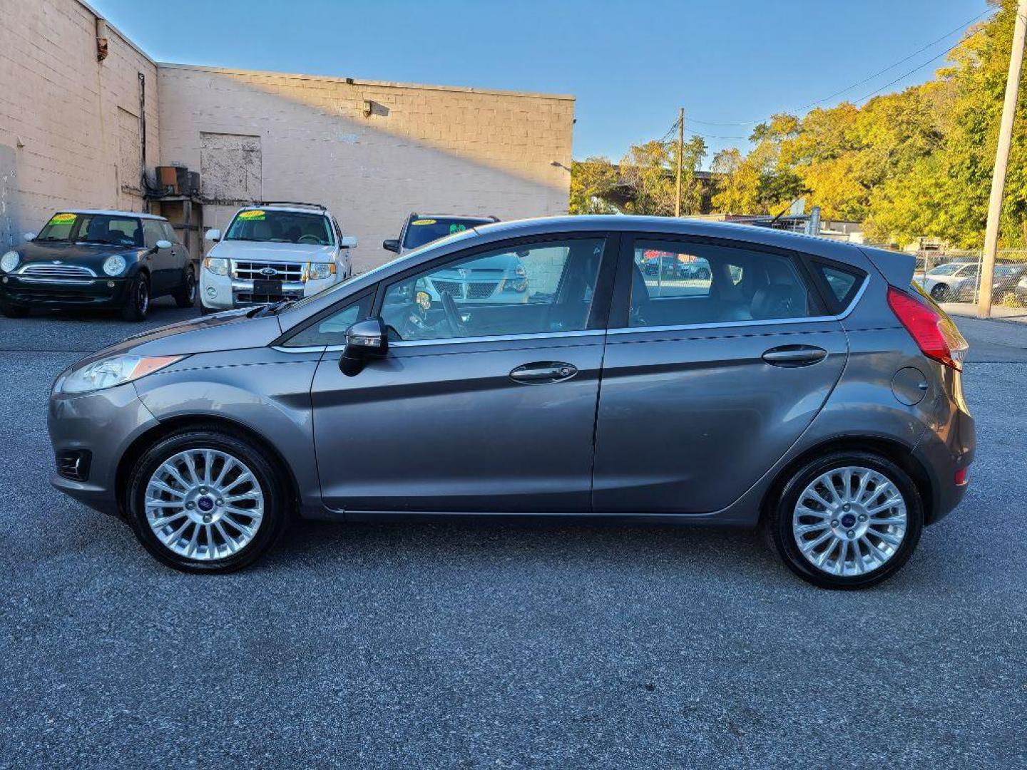 2014 GRAY FORD FIESTA TITANIUM (3FADP4FJ1EM) with an 1.6L engine, Automatic transmission, located at 117 North Cameron Street, Harrisburg, PA, 17101, (717) 963-8962, 40.266762, -76.875259 - WE FINANCE!!! Good Credit/ Bad Credit/ No Credit - ALL Trade-Ins Welcomed!!! ***Guaranteed Credit Approval*** APPLY ONLINE or CALL us TODAY ;) Internet Prices and Marketplace Prices are SPECIAL discounted ***CASH DEALS*** Retail Prices are higher. Please call us to discuss your cash and finan - Photo#1