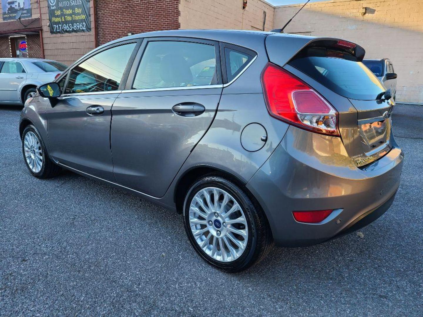 2014 GRAY FORD FIESTA TITANIUM (3FADP4FJ1EM) with an 1.6L engine, Automatic transmission, located at 117 North Cameron Street, Harrisburg, PA, 17101, (717) 963-8962, 40.266762, -76.875259 - WE FINANCE!!! Good Credit/ Bad Credit/ No Credit - ALL Trade-Ins Welcomed!!! ***Guaranteed Credit Approval*** APPLY ONLINE or CALL us TODAY ;) Internet Prices and Marketplace Prices are SPECIAL discounted ***CASH DEALS*** Retail Prices are higher. Please call us to discuss your cash and finan - Photo#2