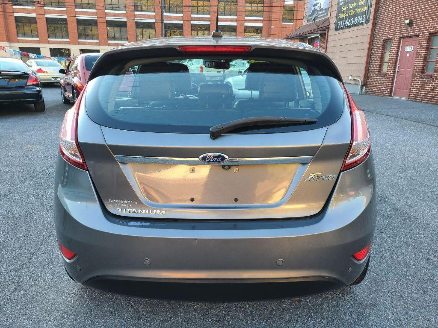 2014 GRAY FORD FIESTA TITANIUM (3FADP4FJ1EM) with an 1.6L engine, Automatic transmission, located at 117 North Cameron Street, Harrisburg, PA, 17101, (717) 963-8962, 40.266762, -76.875259 - WE FINANCE!!! Good Credit/ Bad Credit/ No Credit - ALL Trade-Ins Welcomed!!! ***Guaranteed Credit Approval*** APPLY ONLINE or CALL us TODAY ;) Internet Prices and Marketplace Prices are SPECIAL discounted ***CASH DEALS*** Retail Prices are higher. Please call us to discuss your cash and finan - Photo#3