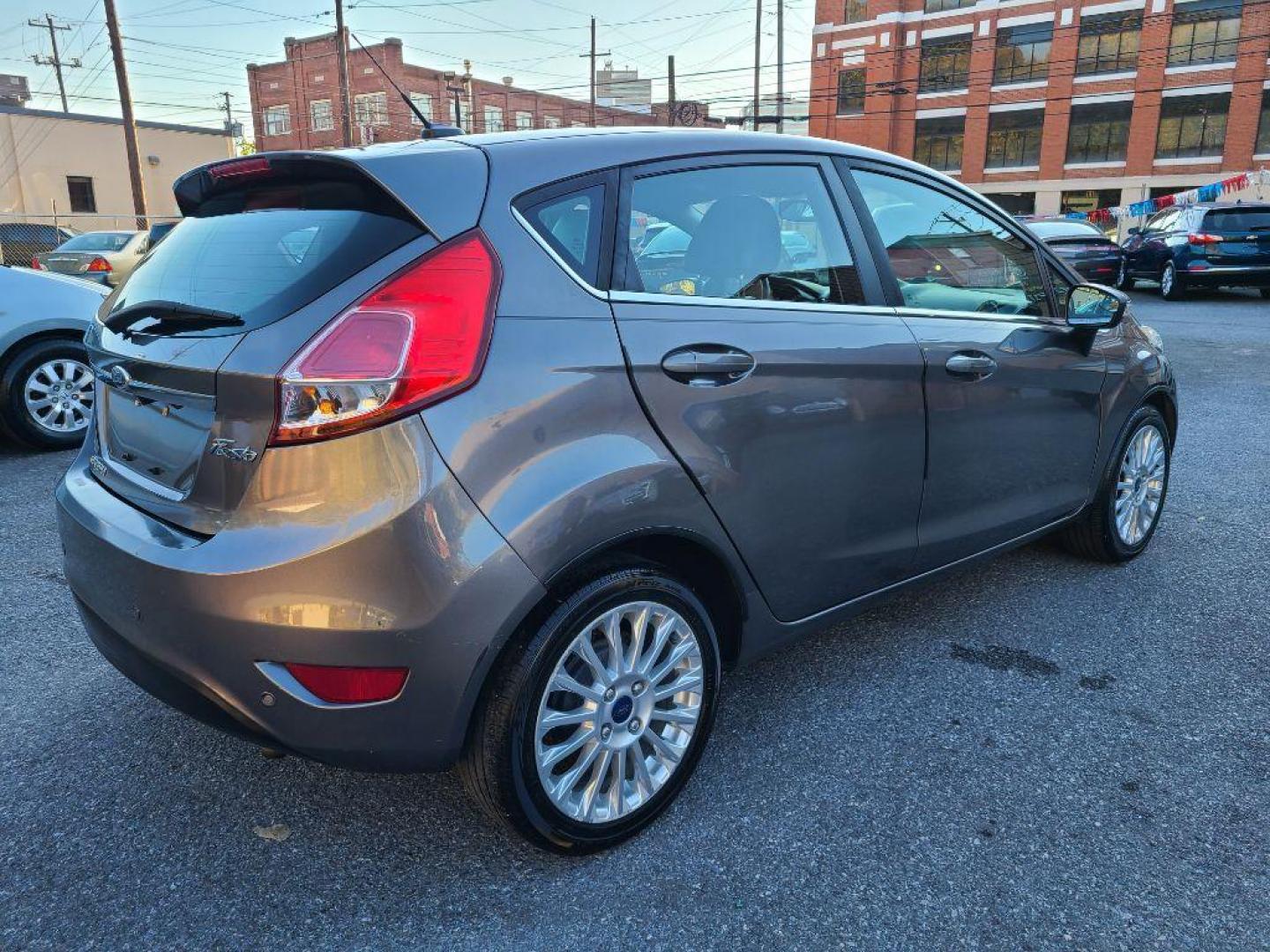 2014 GRAY FORD FIESTA TITANIUM (3FADP4FJ1EM) with an 1.6L engine, Automatic transmission, located at 117 North Cameron Street, Harrisburg, PA, 17101, (717) 963-8962, 40.266762, -76.875259 - WE FINANCE!!! Good Credit/ Bad Credit/ No Credit - ALL Trade-Ins Welcomed!!! ***Guaranteed Credit Approval*** APPLY ONLINE or CALL us TODAY ;) Internet Prices and Marketplace Prices are SPECIAL discounted ***CASH DEALS*** Retail Prices are higher. Please call us to discuss your cash and finan - Photo#4