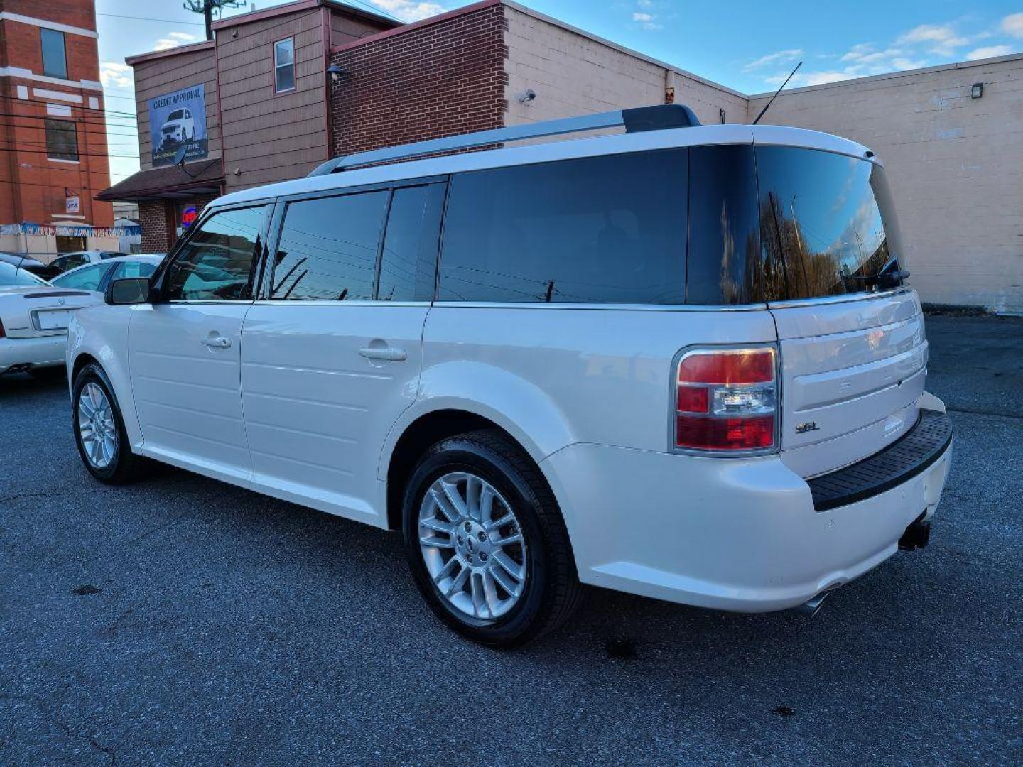 2014 WHITE FORD FLEX SEL (2FMHK6C83EB) with an 3.5L engine, Automatic transmission, located at 7981 Paxton Street, Harrisburg, PA, 17111, (717) 561-2926, 40.261490, -76.749229 - WE FINANCE!!! Good Credit/ Bad Credit/ No Credit - ALL Trade-Ins Welcomed!!! ***Guaranteed Credit Approval*** APPLY ONLINE or CALL us TODAY ;) Internet Prices and Marketplace Prices are SPECIAL discounted ***CASH DEALS*** Retail Prices are higher. Please call us to discuss your cash and finan - Photo#2