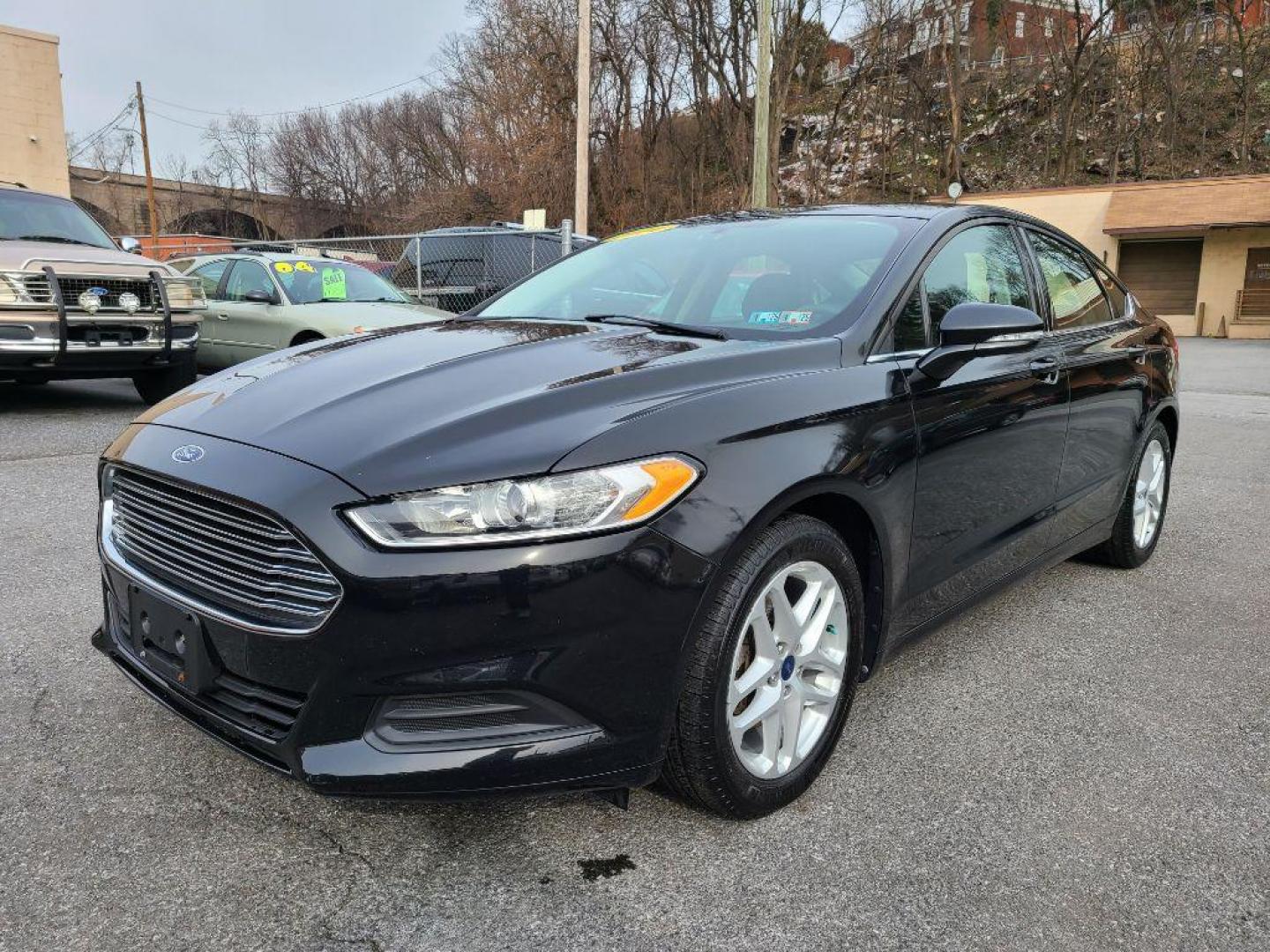 2014 BLACK FORD FUSION SE (3FA6P0H79ER) with an 2.5L engine, Automatic transmission, located at 117 North Cameron Street, Harrisburg, PA, 17101, (717) 963-8962, 40.266762, -76.875259 - WE FINANCE!!! Good Credit/ Bad Credit/ No Credit - ALL Trade-Ins Welcomed!!! ***Guaranteed Credit Approval*** APPLY ONLINE or CALL us TODAY ;) Internet Prices and Marketplace Prices are SPECIAL discounted ***CASH DEALS*** Retail Prices are higher. Please call us to discuss your cash and finan - Photo#0