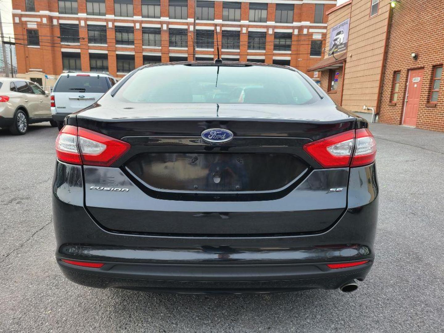 2014 BLACK FORD FUSION SE (3FA6P0H79ER) with an 2.5L engine, Automatic transmission, located at 117 North Cameron Street, Harrisburg, PA, 17101, (717) 963-8962, 40.266762, -76.875259 - WE FINANCE!!! Good Credit/ Bad Credit/ No Credit - ALL Trade-Ins Welcomed!!! ***Guaranteed Credit Approval*** APPLY ONLINE or CALL us TODAY ;) Internet Prices and Marketplace Prices are SPECIAL discounted ***CASH DEALS*** Retail Prices are higher. Please call us to discuss your cash and finan - Photo#3