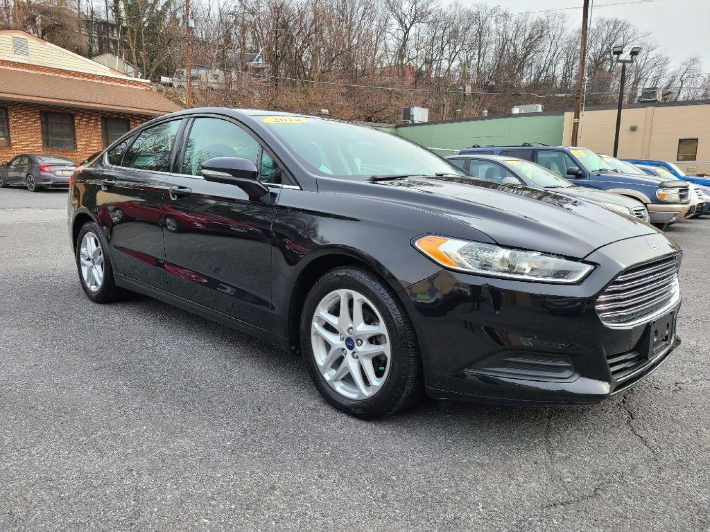 2014 BLACK FORD FUSION SE (3FA6P0H79ER) with an 2.5L engine, Automatic transmission, located at 117 North Cameron Street, Harrisburg, PA, 17101, (717) 963-8962, 40.266762, -76.875259 - WE FINANCE!!! Good Credit/ Bad Credit/ No Credit - ALL Trade-Ins Welcomed!!! ***Guaranteed Credit Approval*** APPLY ONLINE or CALL us TODAY ;) Internet Prices and Marketplace Prices are SPECIAL discounted ***CASH DEALS*** Retail Prices are higher. Please call us to discuss your cash and finan - Photo#5