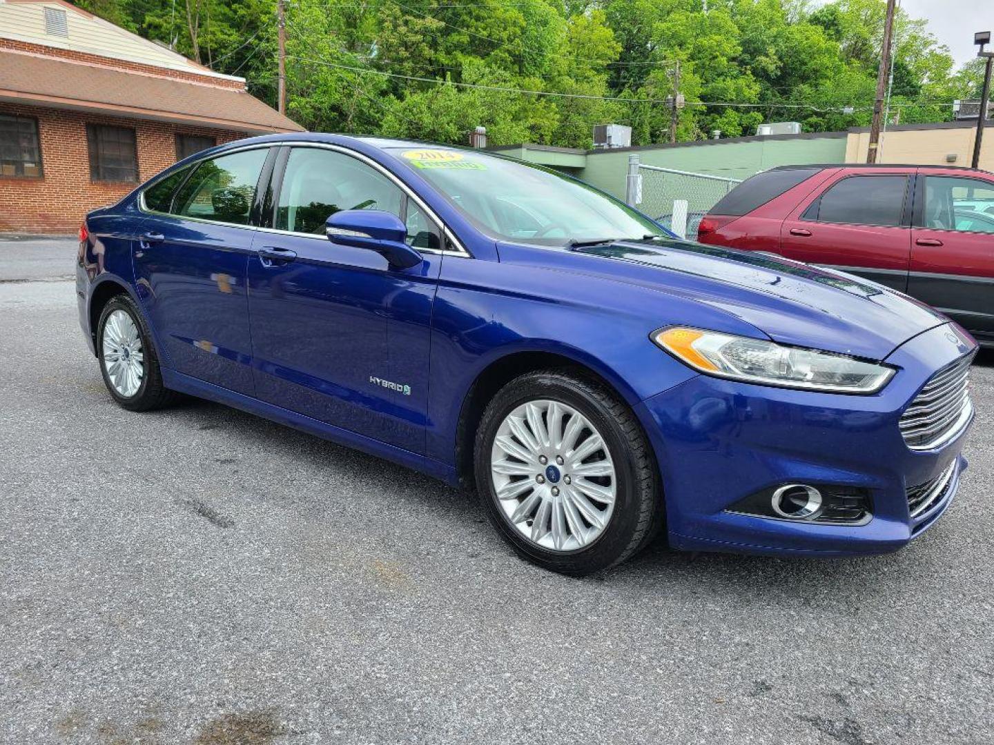 2014 BLUE FORD FUSION SE HYBRID (3FA6P0LU0ER) with an 2.0L engine, Continuously Variable transmission, located at 117 North Cameron Street, Harrisburg, PA, 17101, (717) 963-8962, 40.266762, -76.875259 - WE FINANCE!!! Good Credit/ Bad Credit/ No Credit - ALL Trade-Ins Welcomed!!! ***Guaranteed Credit Approval*** APPLY ONLINE or CALL us TODAY ;) Internet Prices and Marketplace Prices are SPECIAL discounted ***CASH DEALS*** Retail Prices are higher. Please call us to discuss your cash and finan - Photo#6