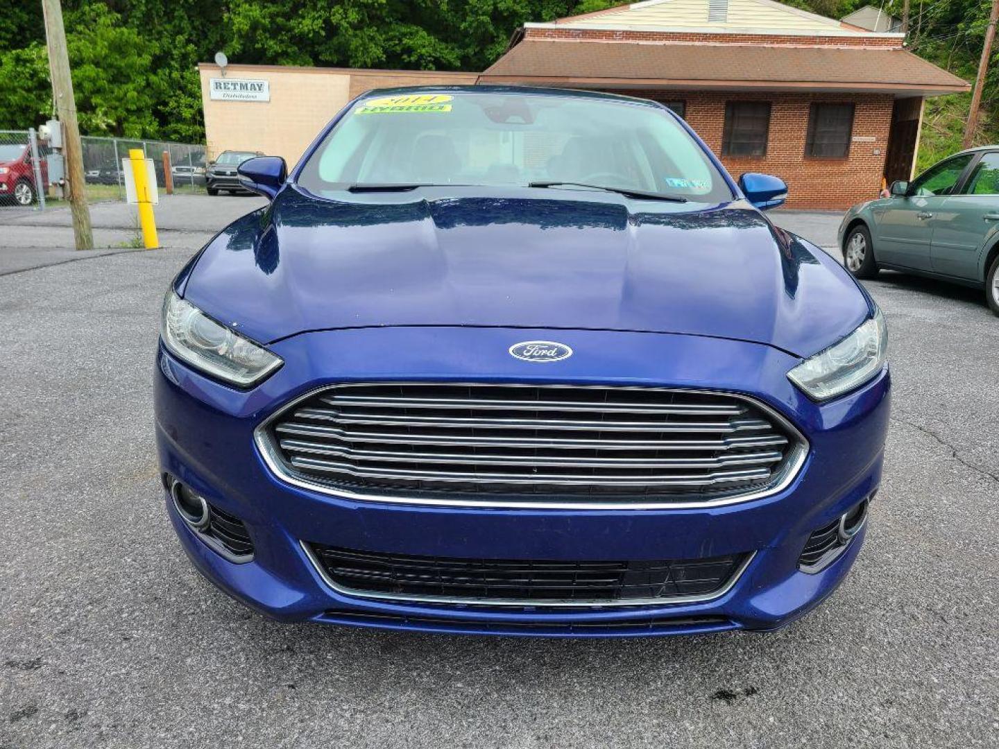 2014 BLUE FORD FUSION SE HYBRID (3FA6P0LU0ER) with an 2.0L engine, Continuously Variable transmission, located at 117 North Cameron Street, Harrisburg, PA, 17101, (717) 963-8962, 40.266762, -76.875259 - WE FINANCE!!! Good Credit/ Bad Credit/ No Credit - ALL Trade-Ins Welcomed!!! ***Guaranteed Credit Approval*** APPLY ONLINE or CALL us TODAY ;) Internet Prices and Marketplace Prices are SPECIAL discounted ***CASH DEALS*** Retail Prices are higher. Please call us to discuss your cash and finan - Photo#7