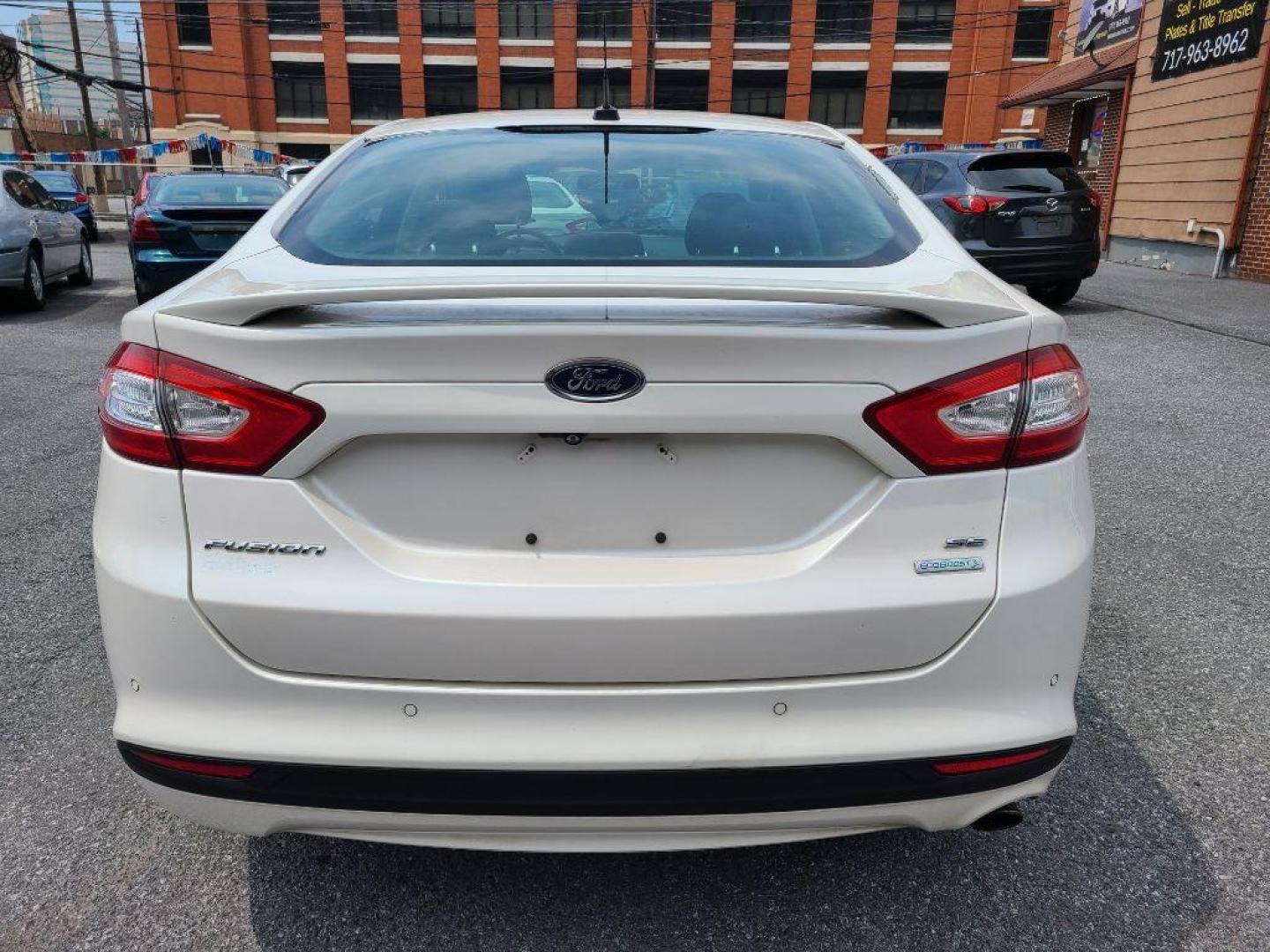 2014 WHITE FORD FUSION SE (1FA6P0HD4E5) with an 1.5L engine, Automatic transmission, located at 7981 Paxton Street, Harrisburg, PA, 17111, (717) 561-2926, 40.261490, -76.749229 - WE FINANCE!!! Good Credit/ Bad Credit/ No Credit - ALL Trade-Ins Welcomed!!! ***Guaranteed Credit Approval*** APPLY ONLINE or CALL us TODAY ;) Internet Prices and Marketplace Prices are SPECIAL discounted ***CASH DEALS*** Retail Prices are higher. Please call us to discuss your cash and finan - Photo#3