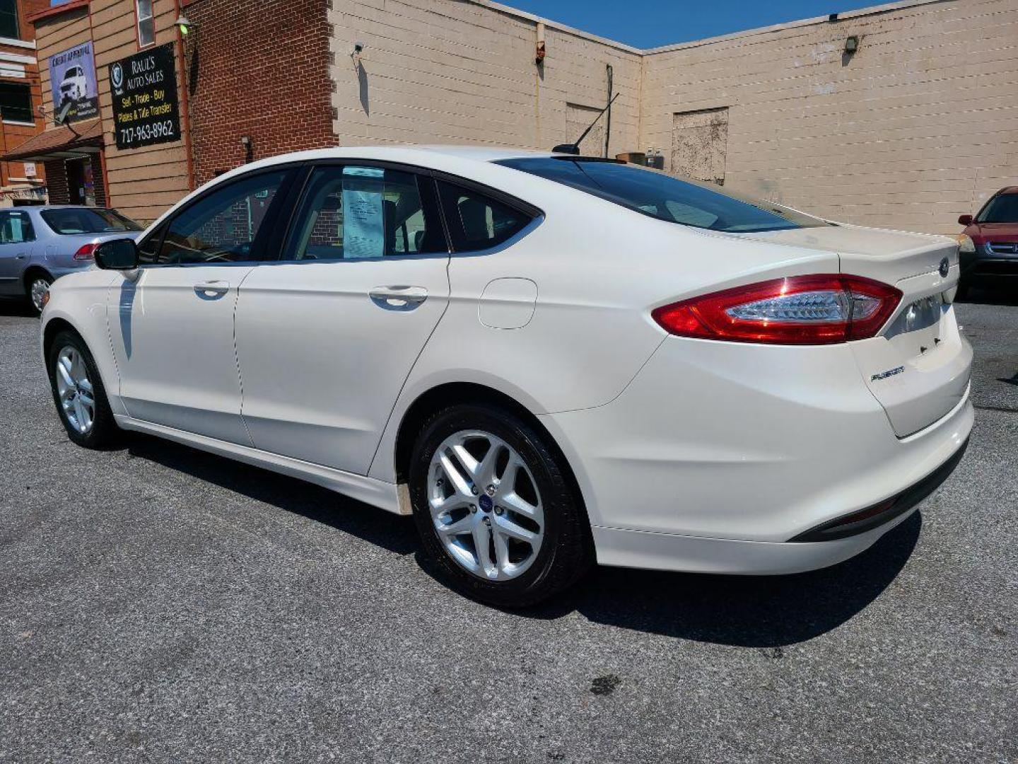 2014 WHITE FORD FUSION SE (1FA6P0H75E5) with an 2.5L engine, Automatic transmission, located at 7981 Paxton Street, Harrisburg, PA, 17111, (717) 561-2926, 40.261490, -76.749229 - WE FINANCE!!! Good Credit/ Bad Credit/ No Credit - ALL Trade-Ins Welcomed!!! ***Guaranteed Credit Approval*** APPLY ONLINE or CALL us TODAY ;) Internet Prices and Marketplace Prices are SPECIAL discounted ***CASH DEALS*** Retail Prices are higher. Please call us to discuss your cash and finan - Photo#2