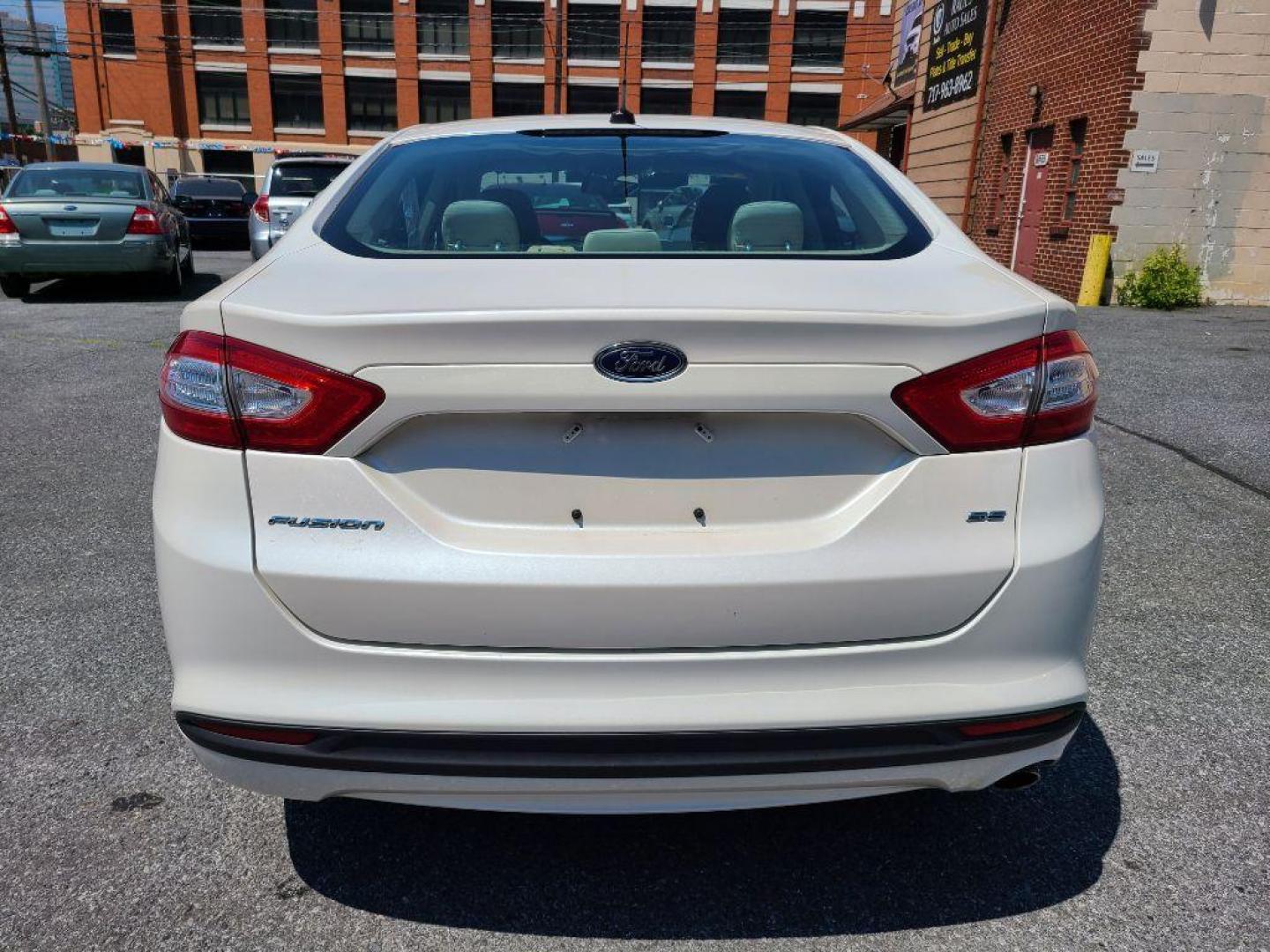 2014 WHITE FORD FUSION SE (1FA6P0H75E5) with an 2.5L engine, Automatic transmission, located at 7981 Paxton Street, Harrisburg, PA, 17111, (717) 561-2926, 40.261490, -76.749229 - WE FINANCE!!! Good Credit/ Bad Credit/ No Credit - ALL Trade-Ins Welcomed!!! ***Guaranteed Credit Approval*** APPLY ONLINE or CALL us TODAY ;) Internet Prices and Marketplace Prices are SPECIAL discounted ***CASH DEALS*** Retail Prices are higher. Please call us to discuss your cash and finan - Photo#3