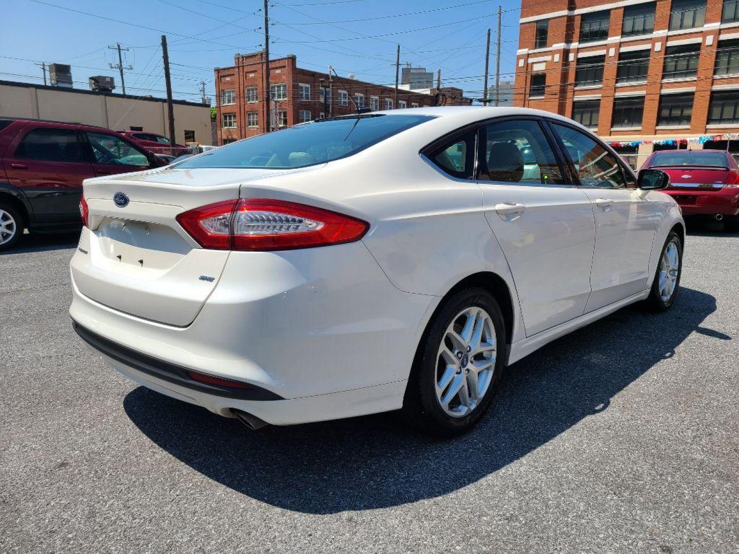 2014 WHITE FORD FUSION SE (1FA6P0H75E5) with an 2.5L engine, Automatic transmission, located at 7981 Paxton Street, Harrisburg, PA, 17111, (717) 561-2926, 40.261490, -76.749229 - WE FINANCE!!! Good Credit/ Bad Credit/ No Credit - ALL Trade-Ins Welcomed!!! ***Guaranteed Credit Approval*** APPLY ONLINE or CALL us TODAY ;) Internet Prices and Marketplace Prices are SPECIAL discounted ***CASH DEALS*** Retail Prices are higher. Please call us to discuss your cash and finan - Photo#4