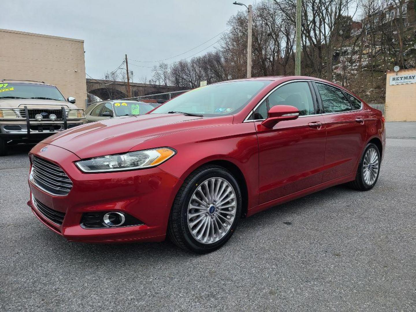 2014 RED FORD FUSION TITANIUM (3FA6P0K93ER) with an 2.0L engine, Automatic transmission, located at 117 North Cameron Street, Harrisburg, PA, 17101, (717) 963-8962, 40.266762, -76.875259 - WE FINANCE!!! Good Credit/ Bad Credit/ No Credit - ALL Trade-Ins Welcomed!!! ***Guaranteed Credit Approval*** APPLY ONLINE or CALL us TODAY ;) Internet Prices and Marketplace Prices are SPECIAL discounted ***CASH DEALS*** Retail Prices are higher. Please call us to discuss your cash and finan - Photo#0