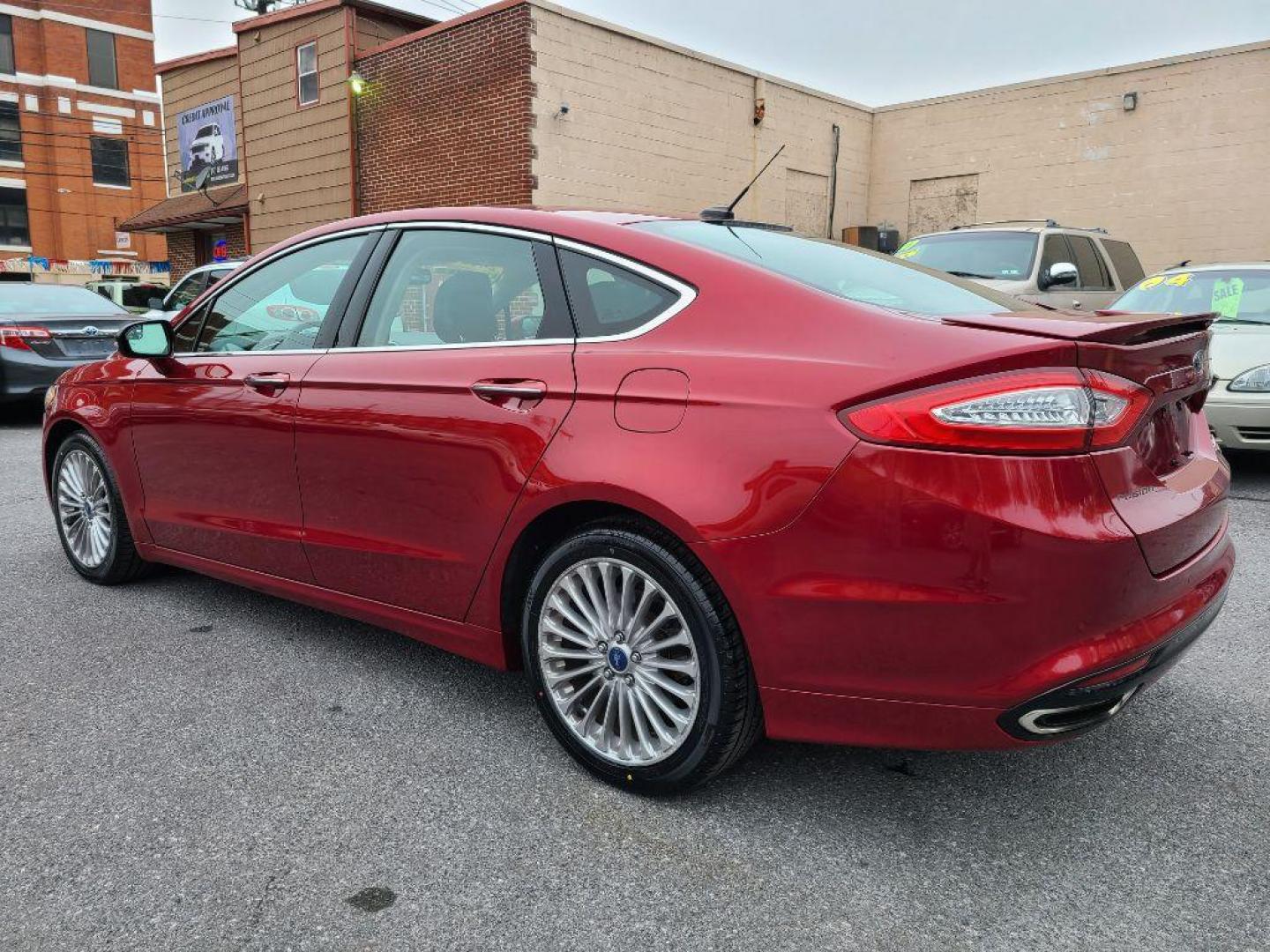 2014 RED FORD FUSION TITANIUM (3FA6P0K93ER) with an 2.0L engine, Automatic transmission, located at 117 North Cameron Street, Harrisburg, PA, 17101, (717) 963-8962, 40.266762, -76.875259 - WE FINANCE!!! Good Credit/ Bad Credit/ No Credit - ALL Trade-Ins Welcomed!!! ***Guaranteed Credit Approval*** APPLY ONLINE or CALL us TODAY ;) Internet Prices and Marketplace Prices are SPECIAL discounted ***CASH DEALS*** Retail Prices are higher. Please call us to discuss your cash and finan - Photo#15