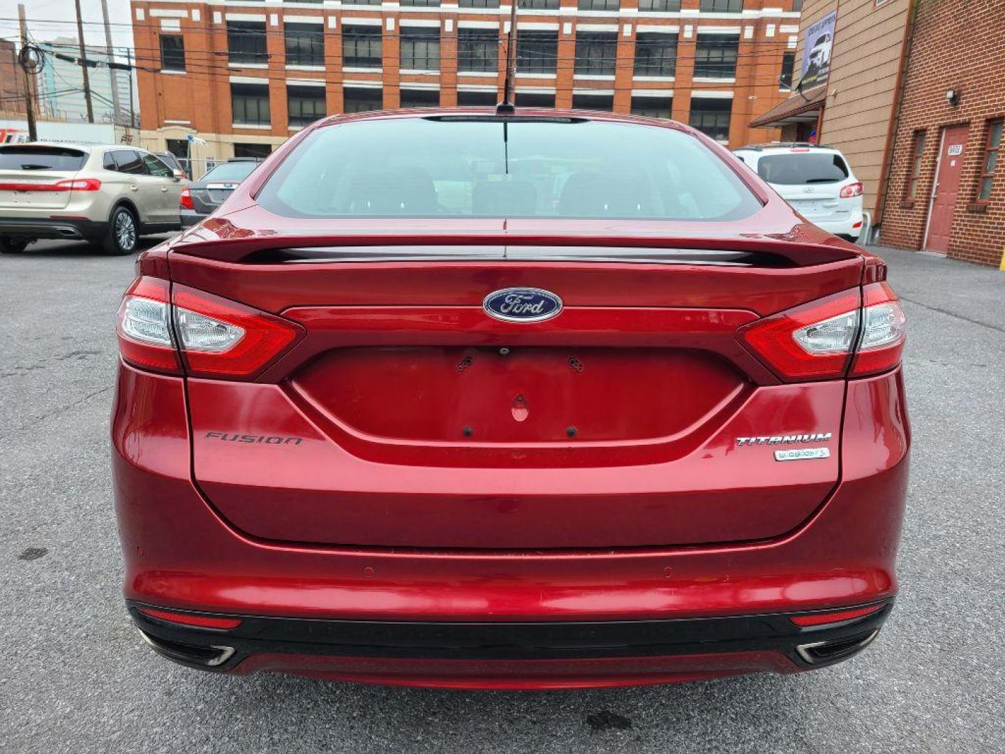 2014 RED FORD FUSION TITANIUM (3FA6P0K93ER) with an 2.0L engine, Automatic transmission, located at 117 North Cameron Street, Harrisburg, PA, 17101, (717) 963-8962, 40.266762, -76.875259 - WE FINANCE!!! Good Credit/ Bad Credit/ No Credit - ALL Trade-Ins Welcomed!!! ***Guaranteed Credit Approval*** APPLY ONLINE or CALL us TODAY ;) Internet Prices and Marketplace Prices are SPECIAL discounted ***CASH DEALS*** Retail Prices are higher. Please call us to discuss your cash and finan - Photo#16