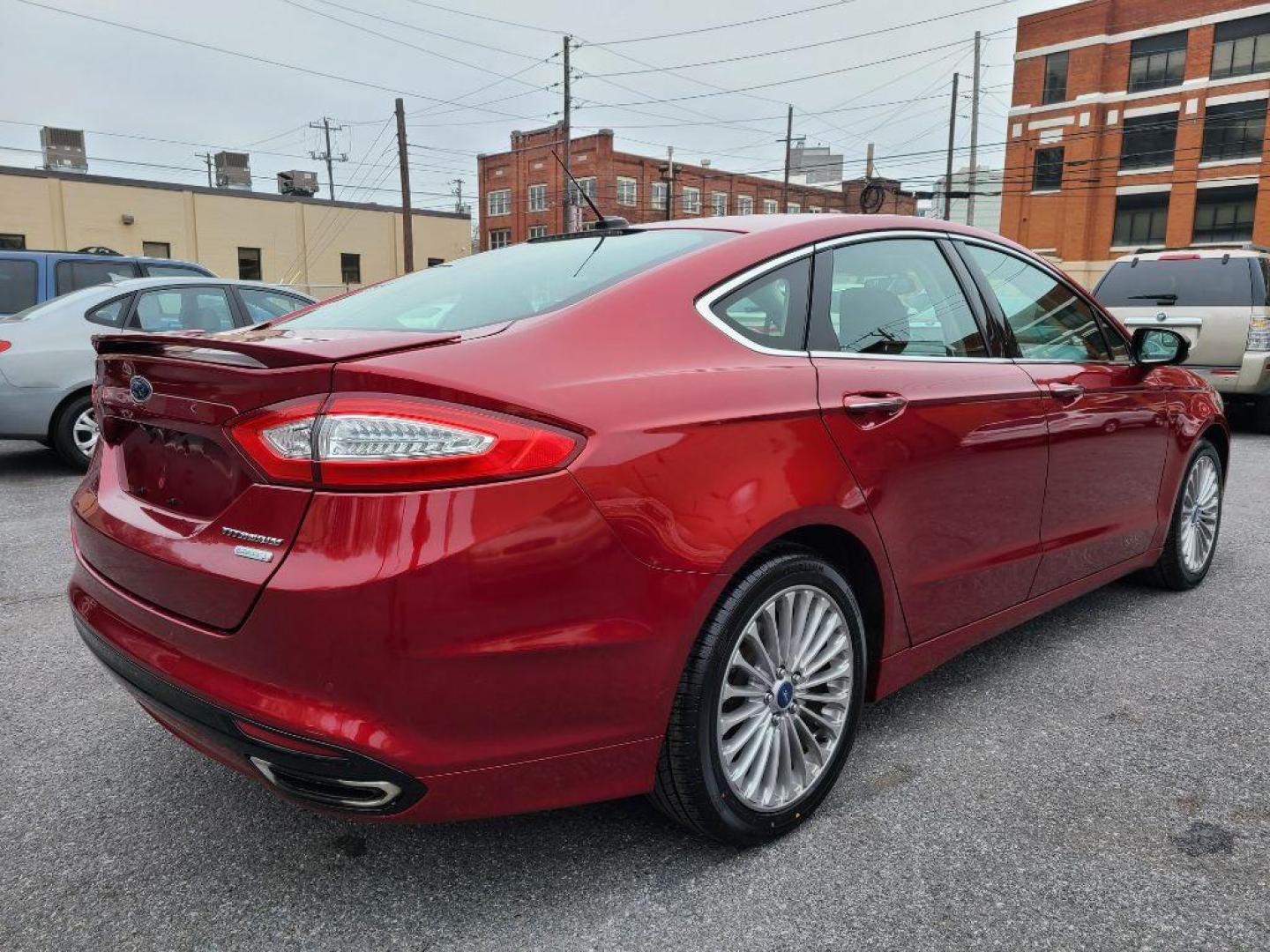 2014 RED FORD FUSION TITANIUM (3FA6P0K93ER) with an 2.0L engine, Automatic transmission, located at 117 North Cameron Street, Harrisburg, PA, 17101, (717) 963-8962, 40.266762, -76.875259 - WE FINANCE!!! Good Credit/ Bad Credit/ No Credit - ALL Trade-Ins Welcomed!!! ***Guaranteed Credit Approval*** APPLY ONLINE or CALL us TODAY ;) Internet Prices and Marketplace Prices are SPECIAL discounted ***CASH DEALS*** Retail Prices are higher. Please call us to discuss your cash and finan - Photo#17