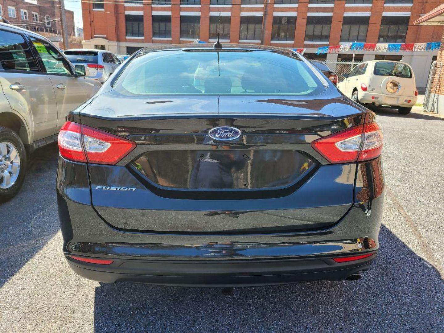 2014 BLACK FORD FUSION S (1FA6P0G79E5) with an 2.5L engine, Automatic transmission, located at 117 North Cameron Street, Harrisburg, PA, 17101, (717) 963-8962, 40.266762, -76.875259 - WE FINANCE!!! Good Credit/ Bad Credit/ No Credit - ALL Trade-Ins Welcomed!!! ***Guaranteed Credit Approval*** APPLY ONLINE or CALL us TODAY ;) Internet Prices and Marketplace Prices are SPECIAL discounted ***CASH DEALS*** Retail Prices are higher. Please call us to discuss your cash and finan - Photo#3