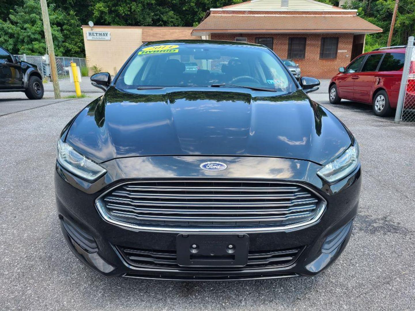 2014 BLACK FORD FUSION SE HYBRID (3FA6P0LU1ER) with an 2.0L engine, Continuously Variable transmission, located at 7981 Paxton Street, Harrisburg, PA, 17111, (717) 561-2926, 40.261490, -76.749229 - WE FINANCE!!! Good Credit/ Bad Credit/ No Credit - ALL Trade-Ins Welcomed!!! ***Guaranteed Credit Approval*** APPLY ONLINE or CALL us TODAY ;) Internet Prices and Marketplace Prices are SPECIAL discounted ***CASH DEALS*** Retail Prices are higher. Please call us to discuss your cash and finan - Photo#7