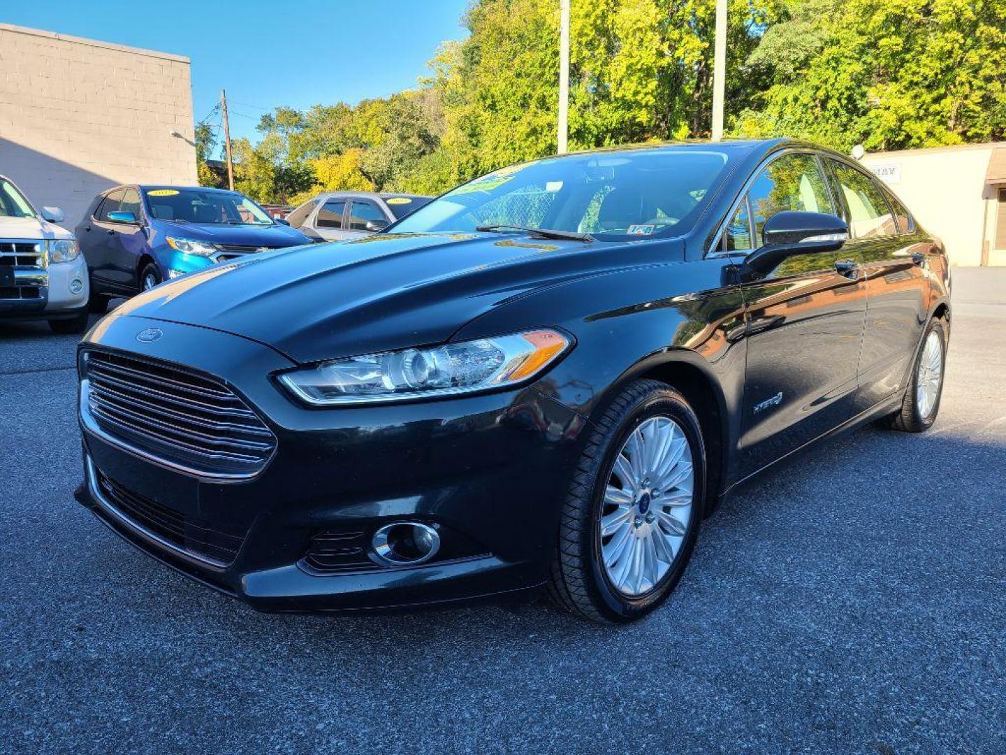 2014 GRAY FORD FUSION SE HYBRID (3FA6P0LU3ER) with an 2.0L engine, Continuously Variable transmission, located at 117 North Cameron Street, Harrisburg, PA, 17101, (717) 963-8962, 40.266762, -76.875259 - WE FINANCE!!! Good Credit/ Bad Credit/ No Credit - ALL Trade-Ins Welcomed!!! ***Guaranteed Credit Approval*** APPLY ONLINE or CALL us TODAY ;) Internet Prices and Marketplace Prices are SPECIAL discounted ***CASH DEALS*** Retail Prices are higher. Please call us to discuss your cash and finan - Photo#0