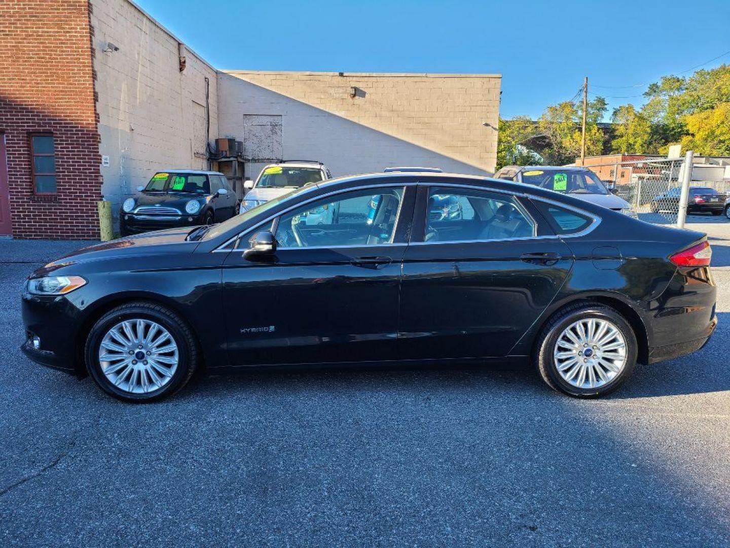 2014 GRAY FORD FUSION SE HYBRID (3FA6P0LU3ER) with an 2.0L engine, Continuously Variable transmission, located at 117 North Cameron Street, Harrisburg, PA, 17101, (717) 963-8962, 40.266762, -76.875259 - WE FINANCE!!! Good Credit/ Bad Credit/ No Credit - ALL Trade-Ins Welcomed!!! ***Guaranteed Credit Approval*** APPLY ONLINE or CALL us TODAY ;) Internet Prices and Marketplace Prices are SPECIAL discounted ***CASH DEALS*** Retail Prices are higher. Please call us to discuss your cash and finan - Photo#1