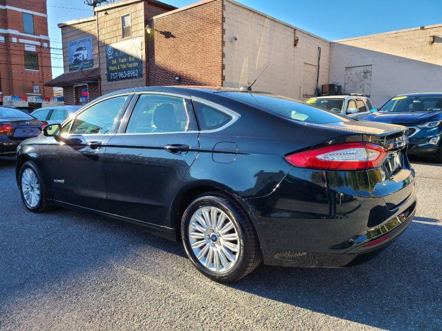 2014 GRAY FORD FUSION SE HYBRID (3FA6P0LU3ER) with an 2.0L engine, Continuously Variable transmission, located at 117 North Cameron Street, Harrisburg, PA, 17101, (717) 963-8962, 40.266762, -76.875259 - WE FINANCE!!! Good Credit/ Bad Credit/ No Credit - ALL Trade-Ins Welcomed!!! ***Guaranteed Credit Approval*** APPLY ONLINE or CALL us TODAY ;) Internet Prices and Marketplace Prices are SPECIAL discounted ***CASH DEALS*** Retail Prices are higher. Please call us to discuss your cash and finan - Photo#2