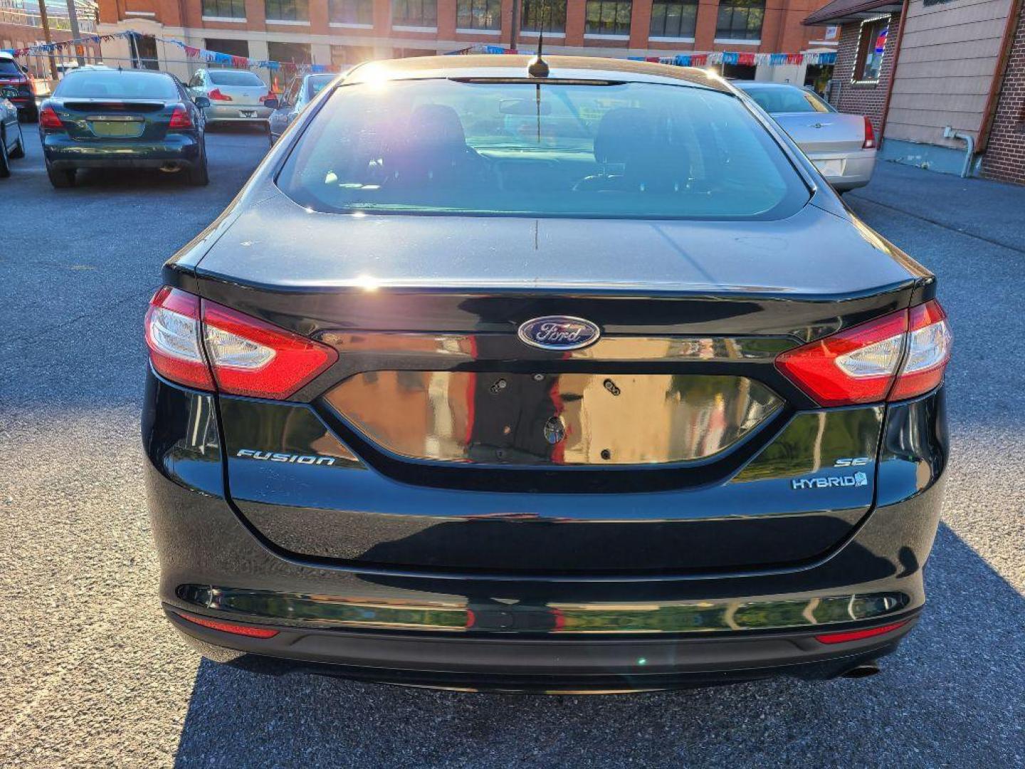 2014 GRAY FORD FUSION SE HYBRID (3FA6P0LU3ER) with an 2.0L engine, Continuously Variable transmission, located at 117 North Cameron Street, Harrisburg, PA, 17101, (717) 963-8962, 40.266762, -76.875259 - WE FINANCE!!! Good Credit/ Bad Credit/ No Credit - ALL Trade-Ins Welcomed!!! ***Guaranteed Credit Approval*** APPLY ONLINE or CALL us TODAY ;) Internet Prices and Marketplace Prices are SPECIAL discounted ***CASH DEALS*** Retail Prices are higher. Please call us to discuss your cash and finan - Photo#3