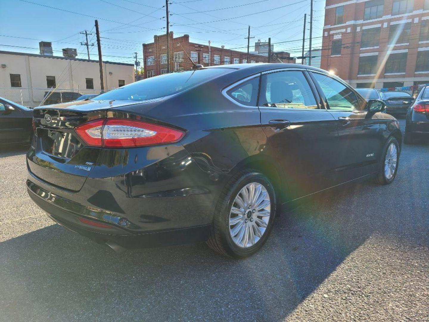 2014 GRAY FORD FUSION SE HYBRID (3FA6P0LU3ER) with an 2.0L engine, Continuously Variable transmission, located at 117 North Cameron Street, Harrisburg, PA, 17101, (717) 963-8962, 40.266762, -76.875259 - WE FINANCE!!! Good Credit/ Bad Credit/ No Credit - ALL Trade-Ins Welcomed!!! ***Guaranteed Credit Approval*** APPLY ONLINE or CALL us TODAY ;) Internet Prices and Marketplace Prices are SPECIAL discounted ***CASH DEALS*** Retail Prices are higher. Please call us to discuss your cash and finan - Photo#4