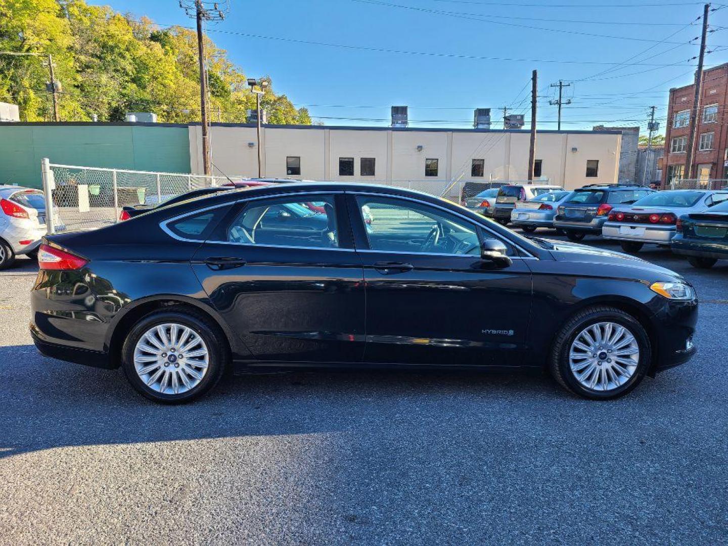 2014 GRAY FORD FUSION SE HYBRID (3FA6P0LU3ER) with an 2.0L engine, Continuously Variable transmission, located at 117 North Cameron Street, Harrisburg, PA, 17101, (717) 963-8962, 40.266762, -76.875259 - WE FINANCE!!! Good Credit/ Bad Credit/ No Credit - ALL Trade-Ins Welcomed!!! ***Guaranteed Credit Approval*** APPLY ONLINE or CALL us TODAY ;) Internet Prices and Marketplace Prices are SPECIAL discounted ***CASH DEALS*** Retail Prices are higher. Please call us to discuss your cash and finan - Photo#5