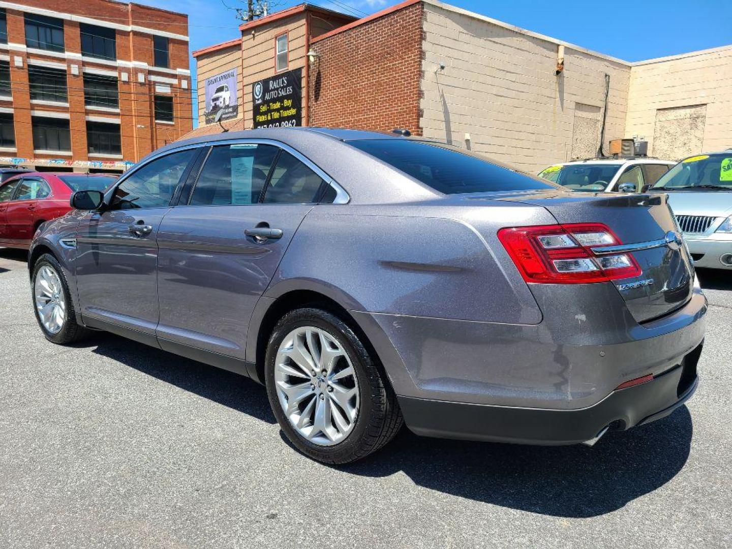 2014 GRAY FORD TAURUS LIMITED (1FAHP2F8XEG) with an 3.5L engine, Automatic transmission, located at 117 North Cameron Street, Harrisburg, PA, 17101, (717) 963-8962, 40.266762, -76.875259 - WE FINANCE!!! Good Credit/ Bad Credit/ No Credit - ALL Trade-Ins Welcomed!!! ***Guaranteed Credit Approval*** APPLY ONLINE or CALL us TODAY ;) Internet Prices and Marketplace Prices are SPECIAL discounted ***CASH DEALS*** Retail Prices are higher. Please call us to discuss your cash and finan - Photo#2