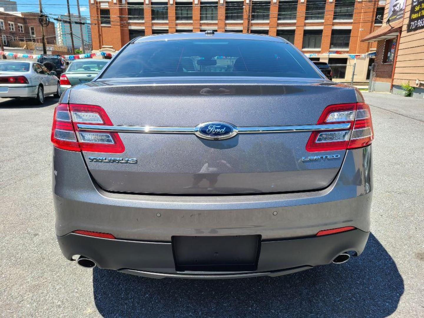 2014 GRAY FORD TAURUS LIMITED (1FAHP2F8XEG) with an 3.5L engine, Automatic transmission, located at 117 North Cameron Street, Harrisburg, PA, 17101, (717) 963-8962, 40.266762, -76.875259 - WE FINANCE!!! Good Credit/ Bad Credit/ No Credit - ALL Trade-Ins Welcomed!!! ***Guaranteed Credit Approval*** APPLY ONLINE or CALL us TODAY ;) Internet Prices and Marketplace Prices are SPECIAL discounted ***CASH DEALS*** Retail Prices are higher. Please call us to discuss your cash and finan - Photo#3